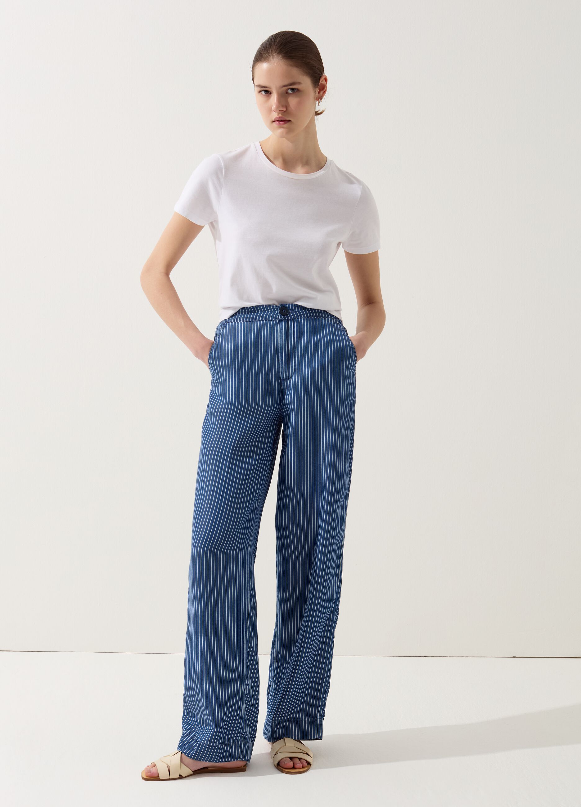 Wide-leg pinstriped jeans in fluid fabric