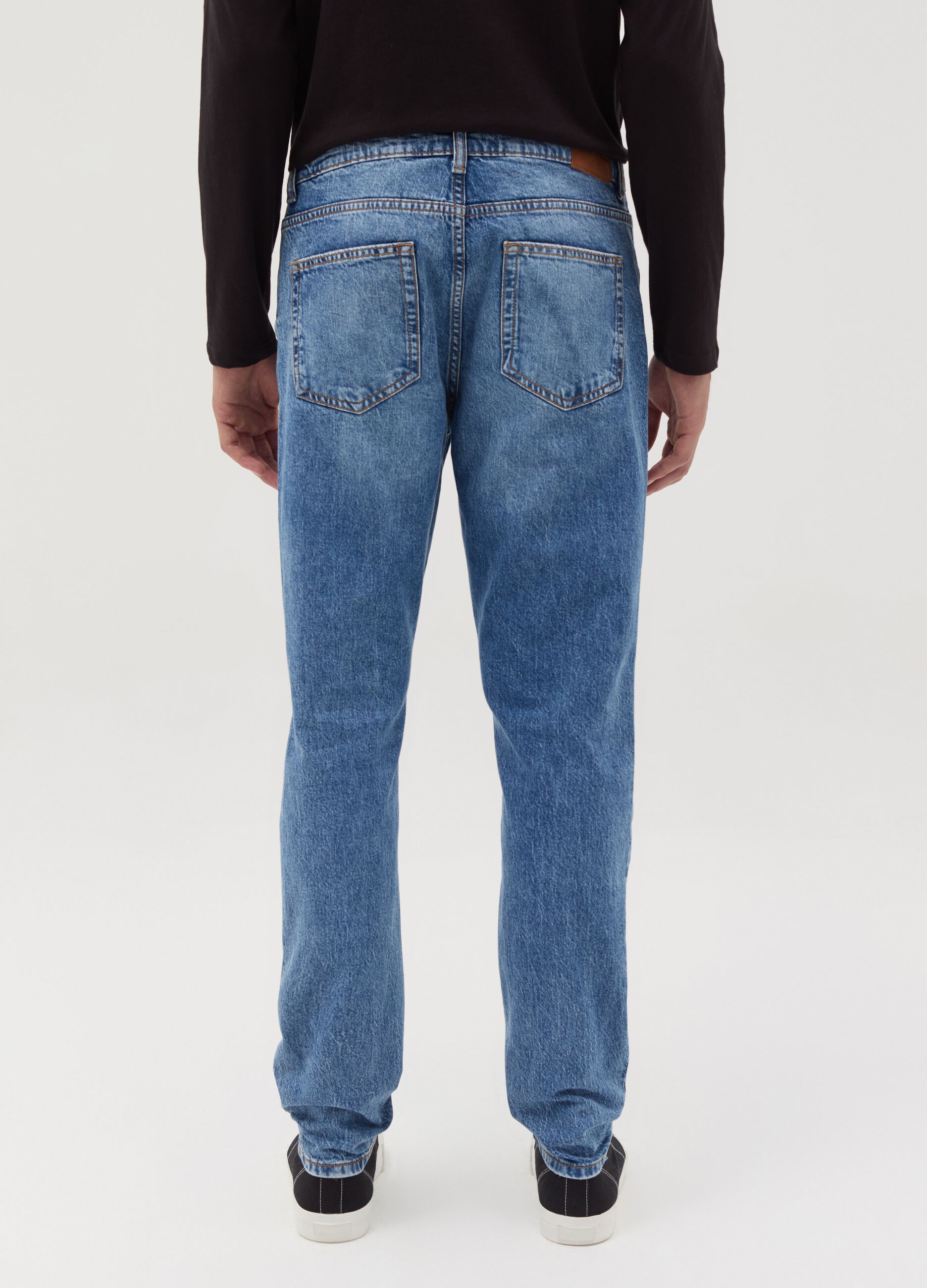 Slim-fit acid-wash jeans with fading