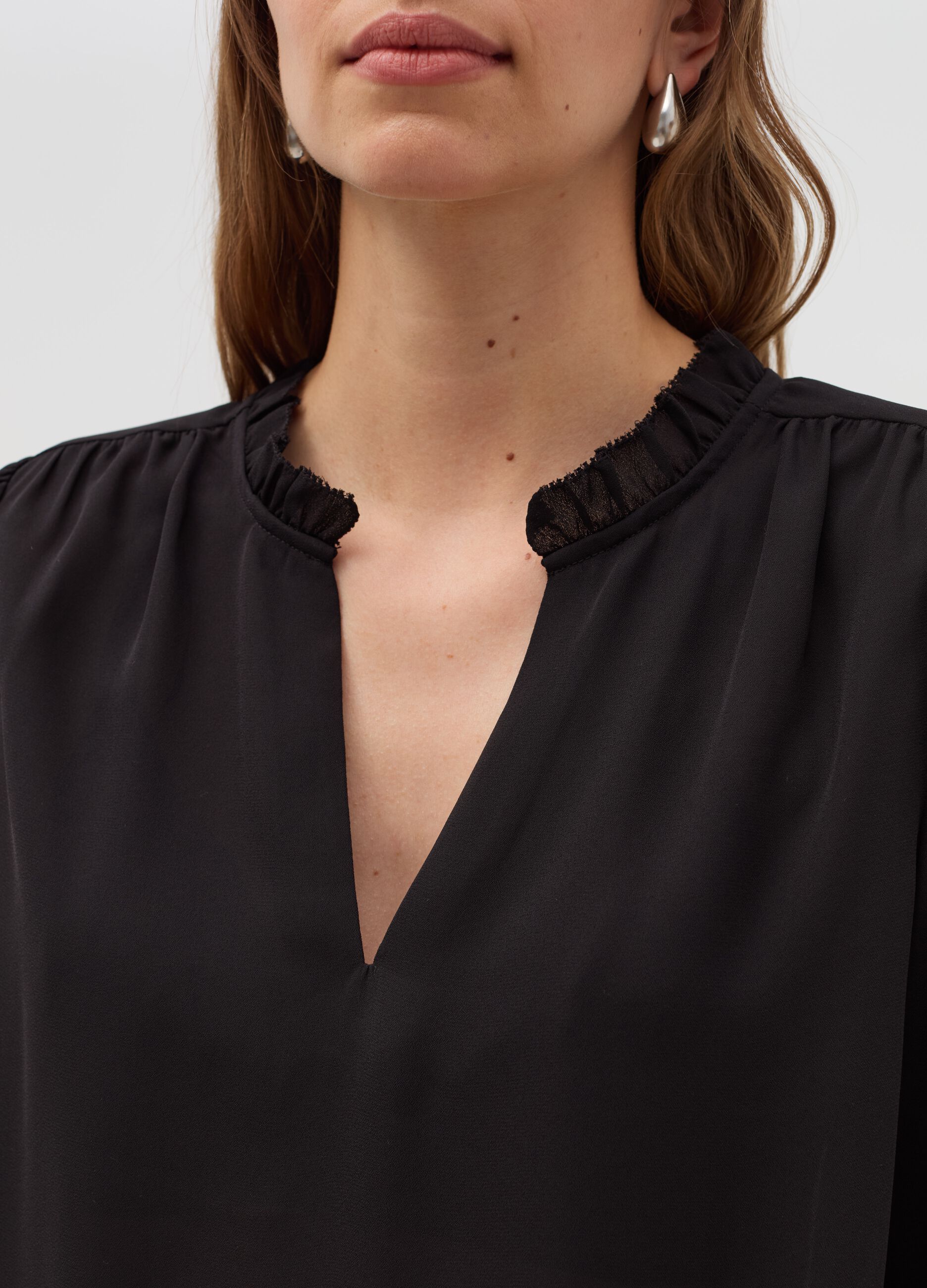 Semi-sheer blouse with frill