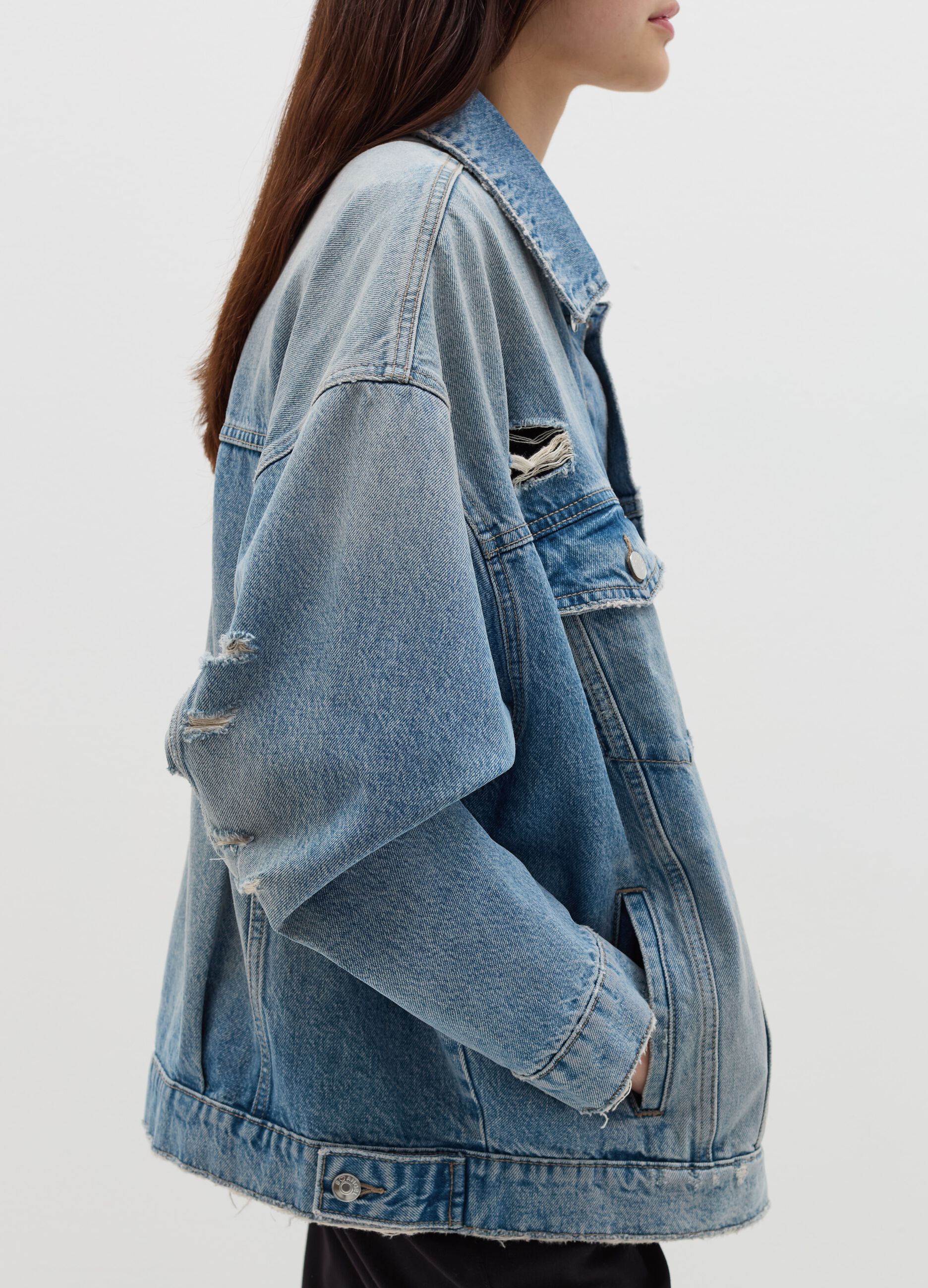 Denim jacket with abrasions