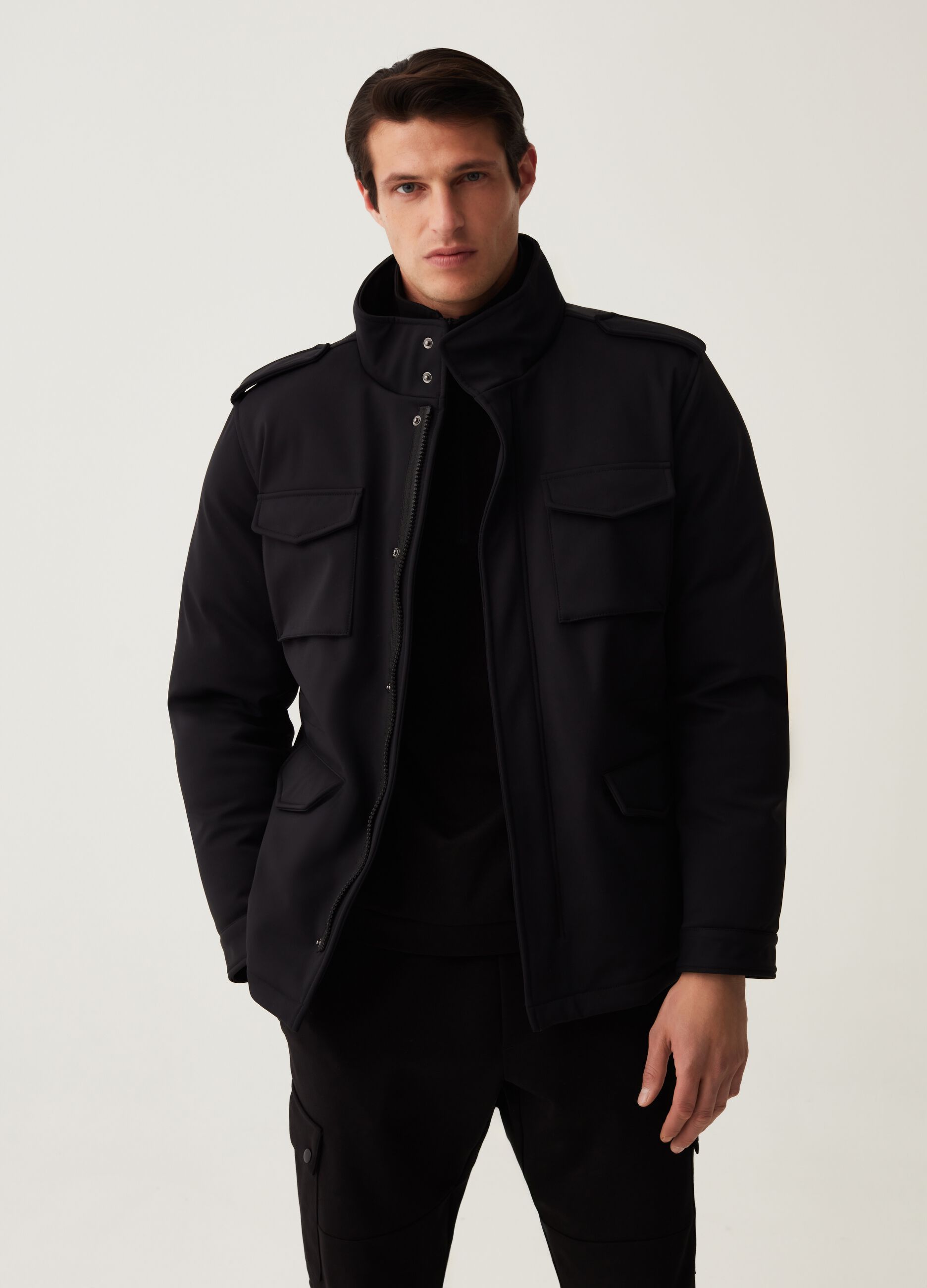 Man's Black LESS IS BETTER multi-pocket padded jacket. | OVS