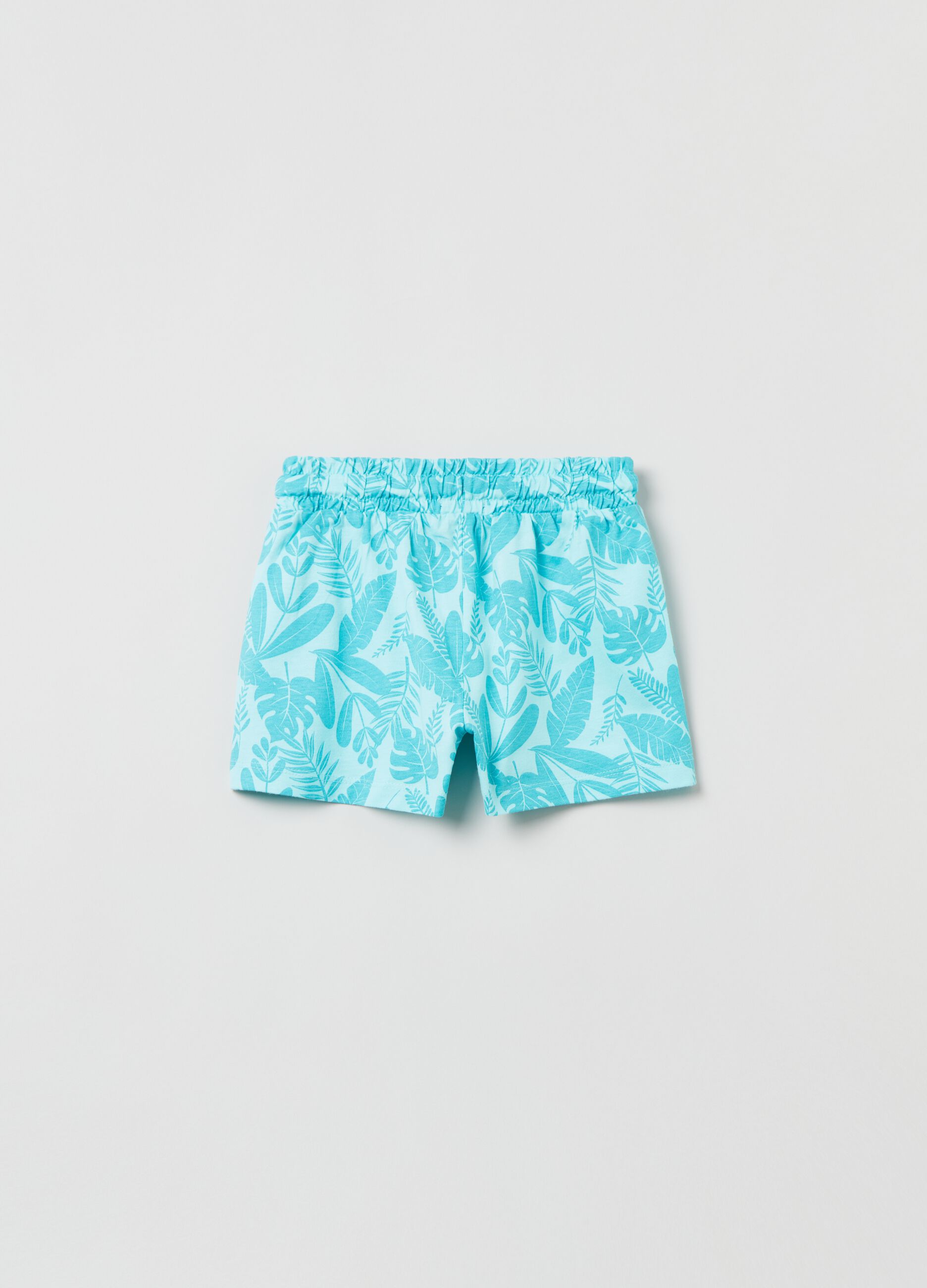 Shorts with all-over tropical leaves print