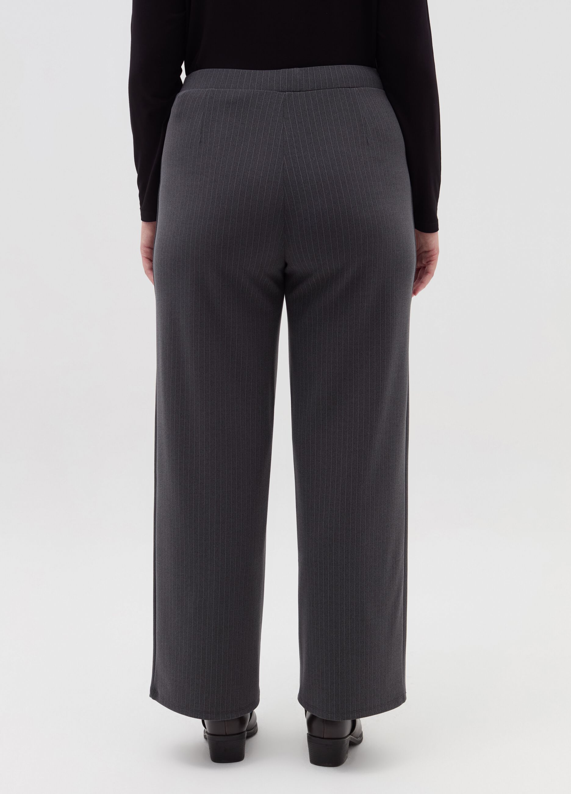 Wide trousers with buttons