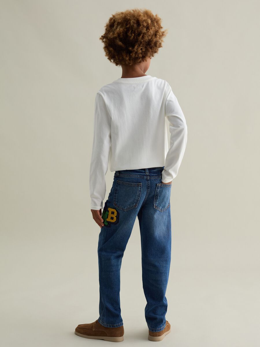 Five-pocket jeans with bouclé patch_1