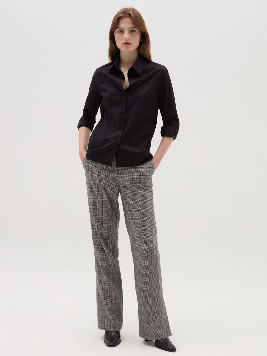 Trousers with splits on the hem_0