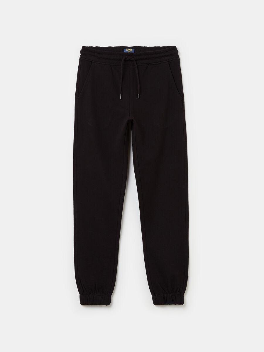 Solid colour fleece joggers with drawstring_0
