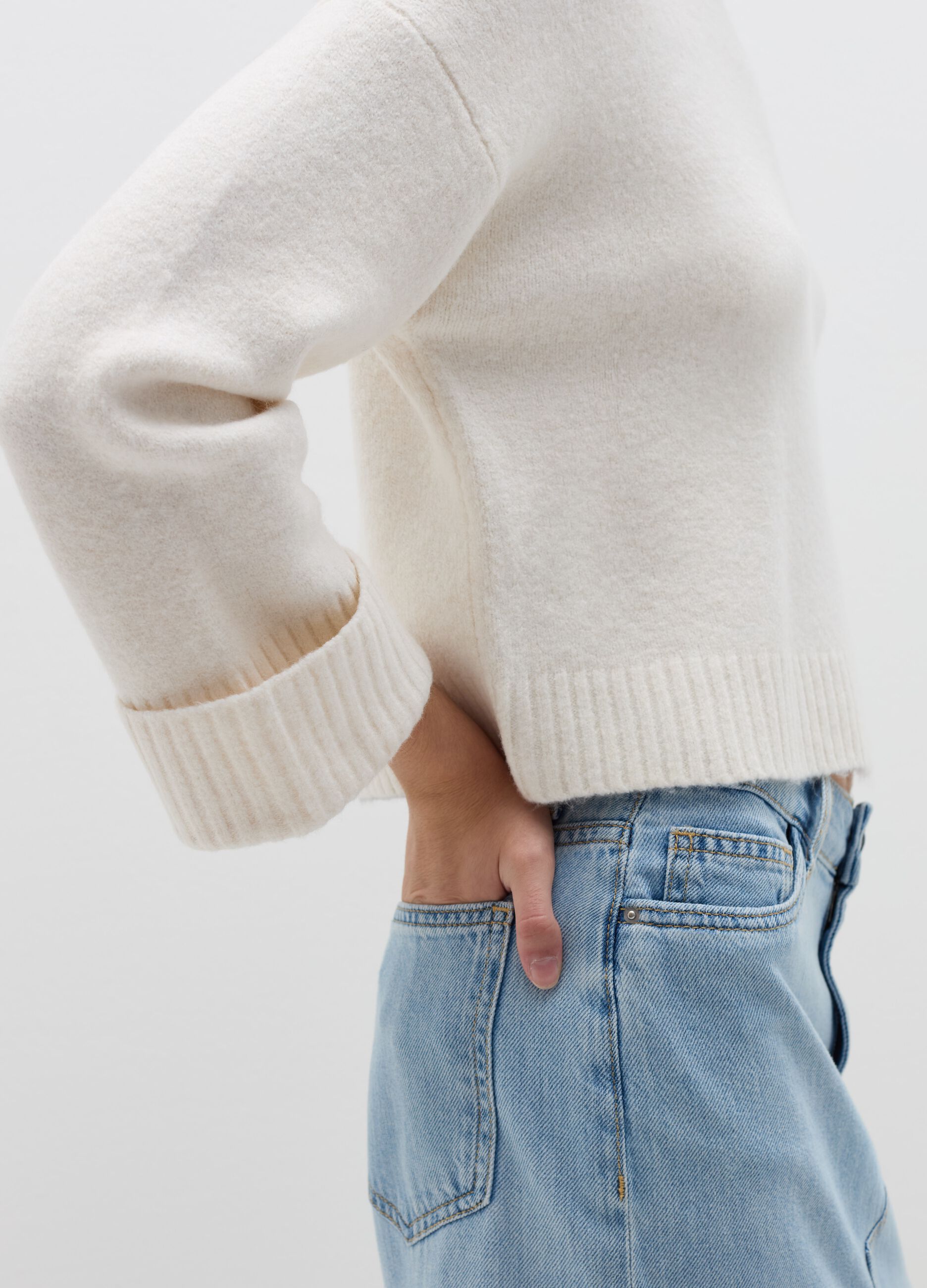 Pullover crop con risvolti