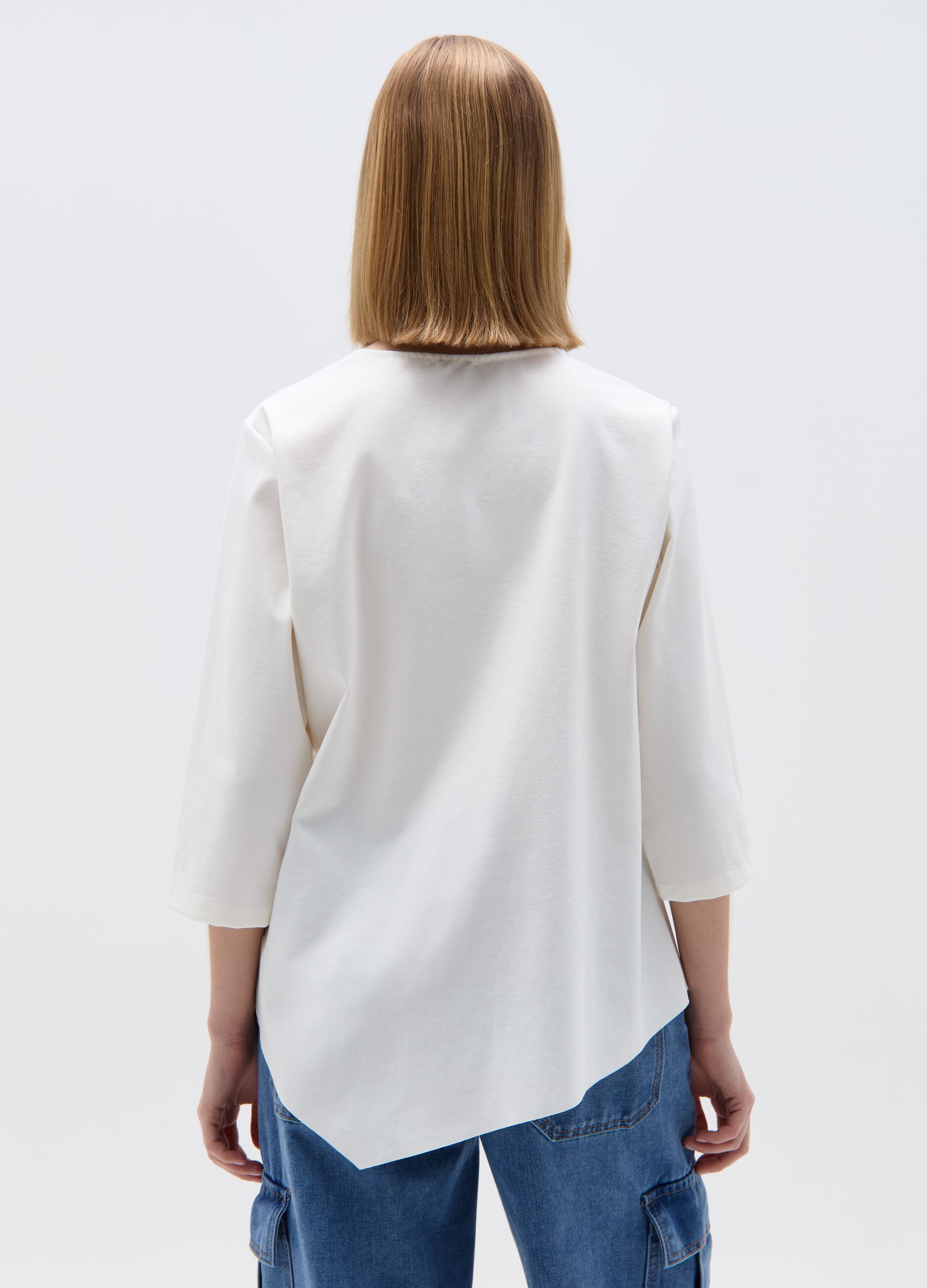 Asymmetric blouse with side bow