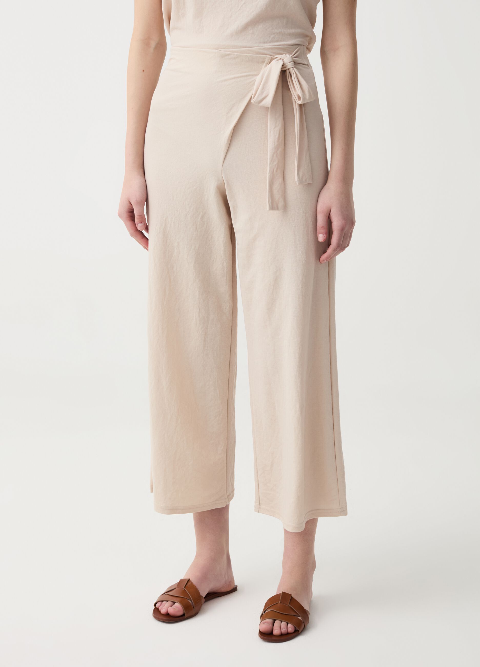 Wide-leg trousers with wraparound fastening