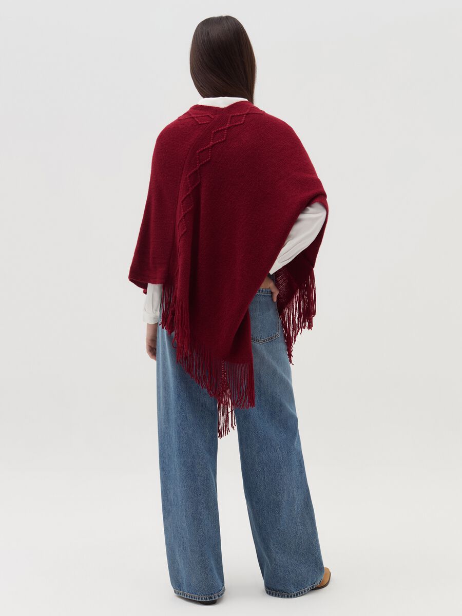 Poncho with diamond design and fringing_5