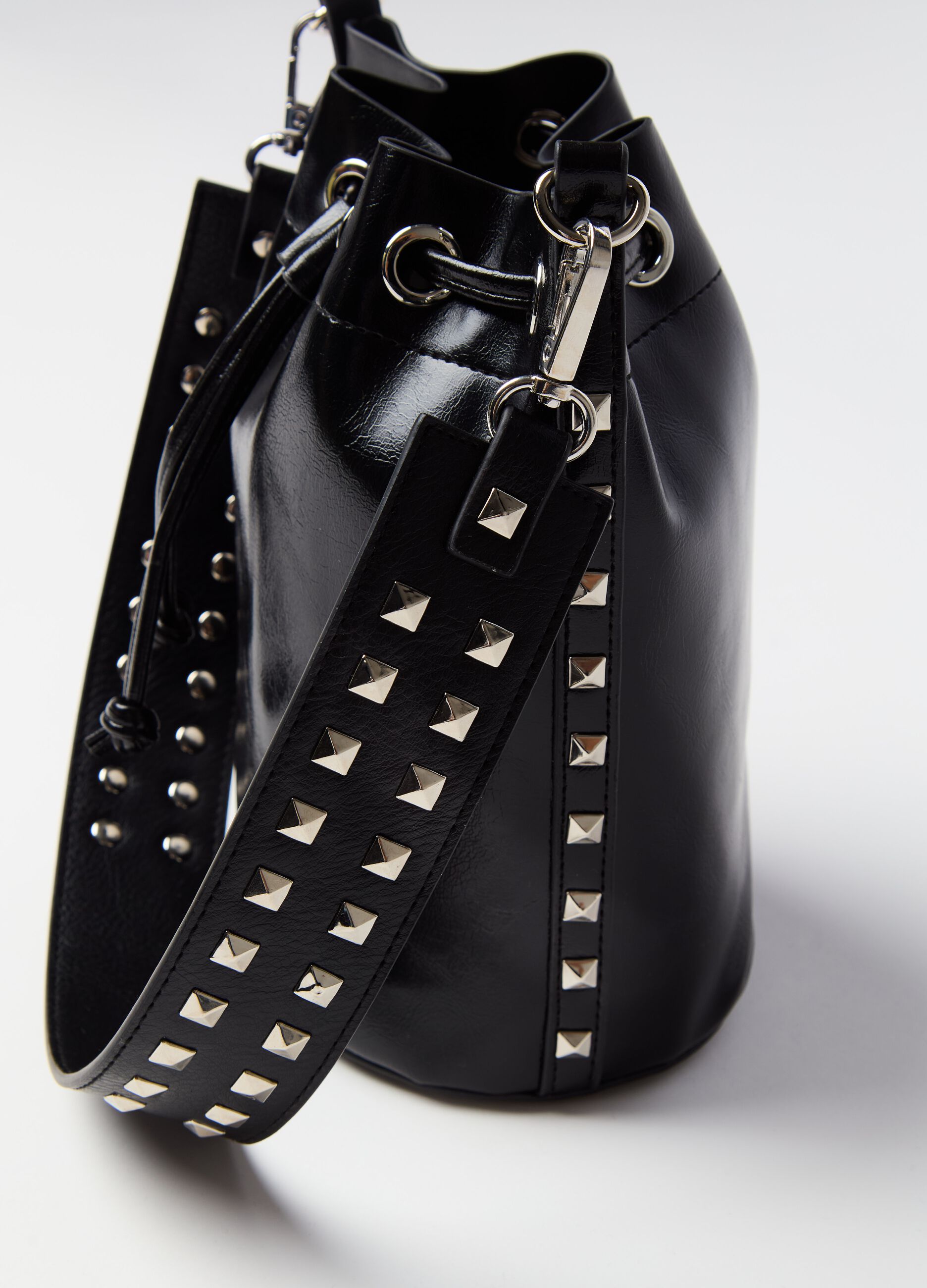 Bucket bag with shoulder strap and studs