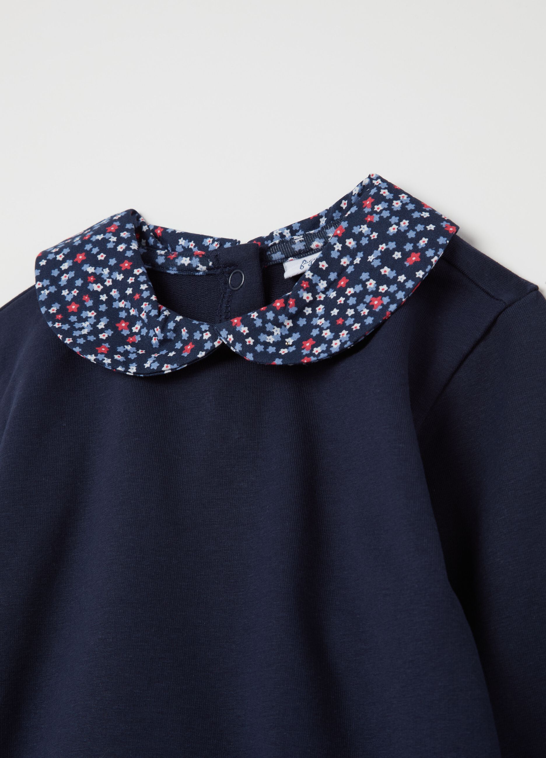 Sweatshirt in French terry with collar with flower