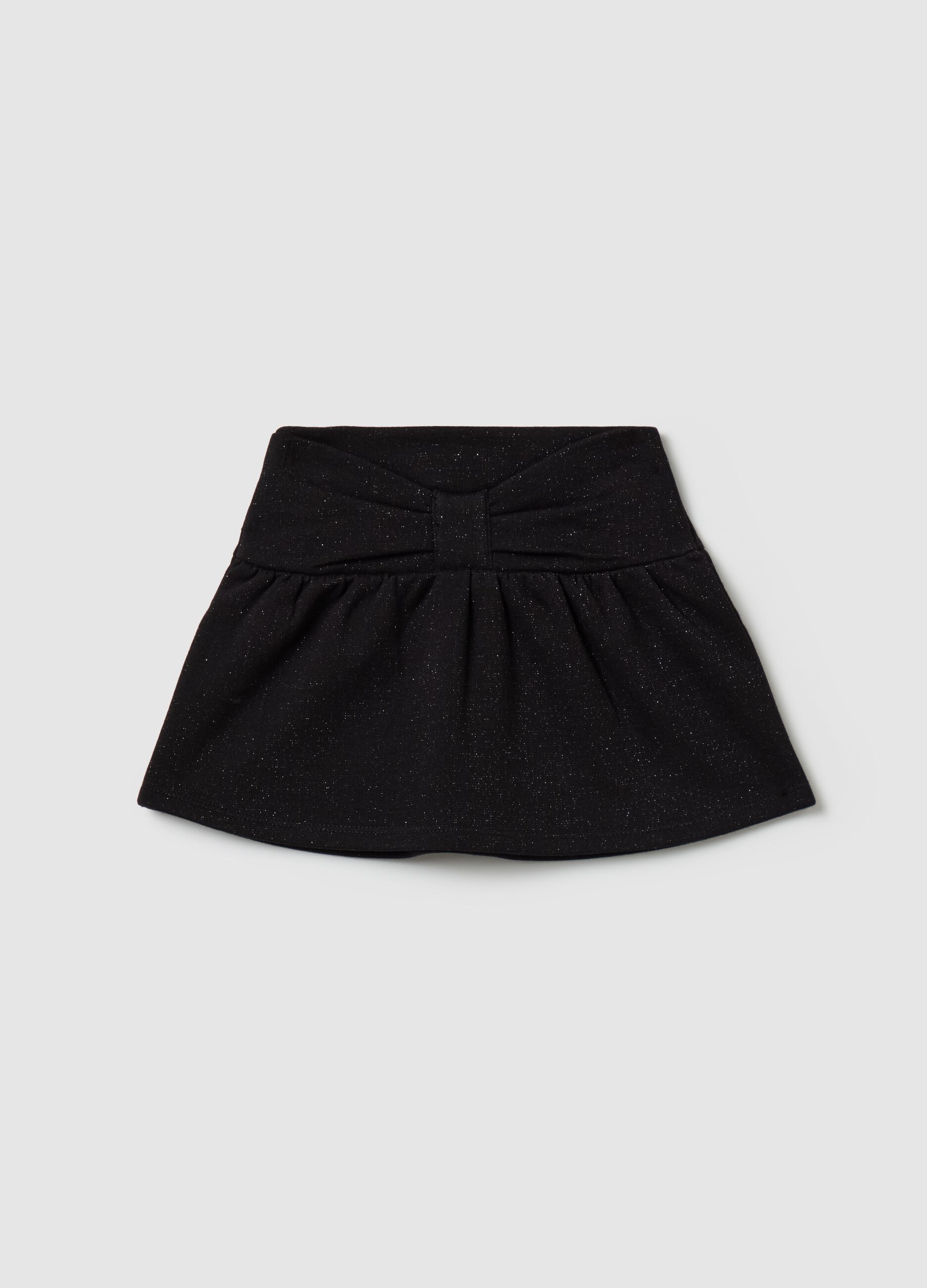 Short skirt with lurex and bow