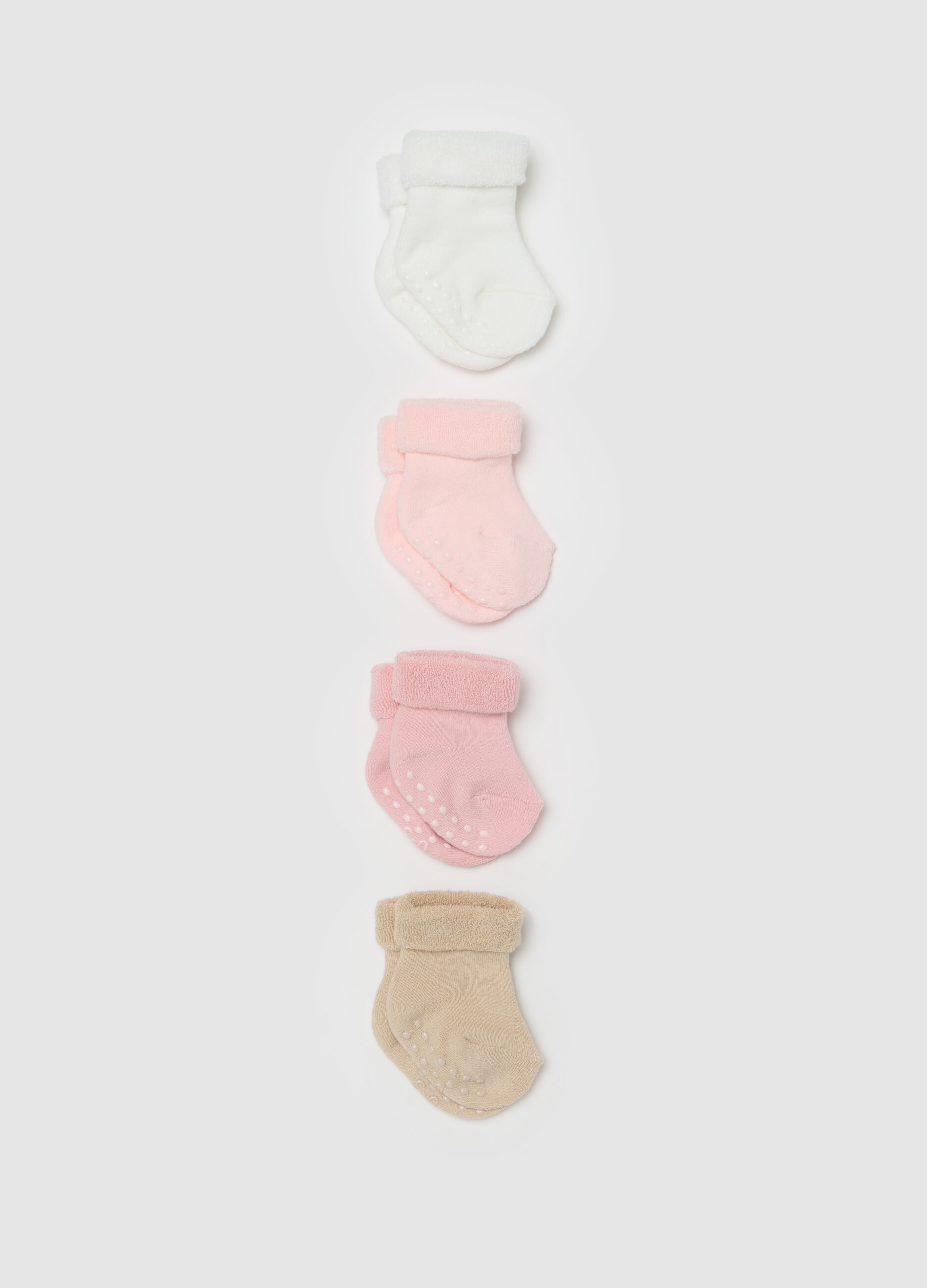 Four-pair pack socks in solid colour terry