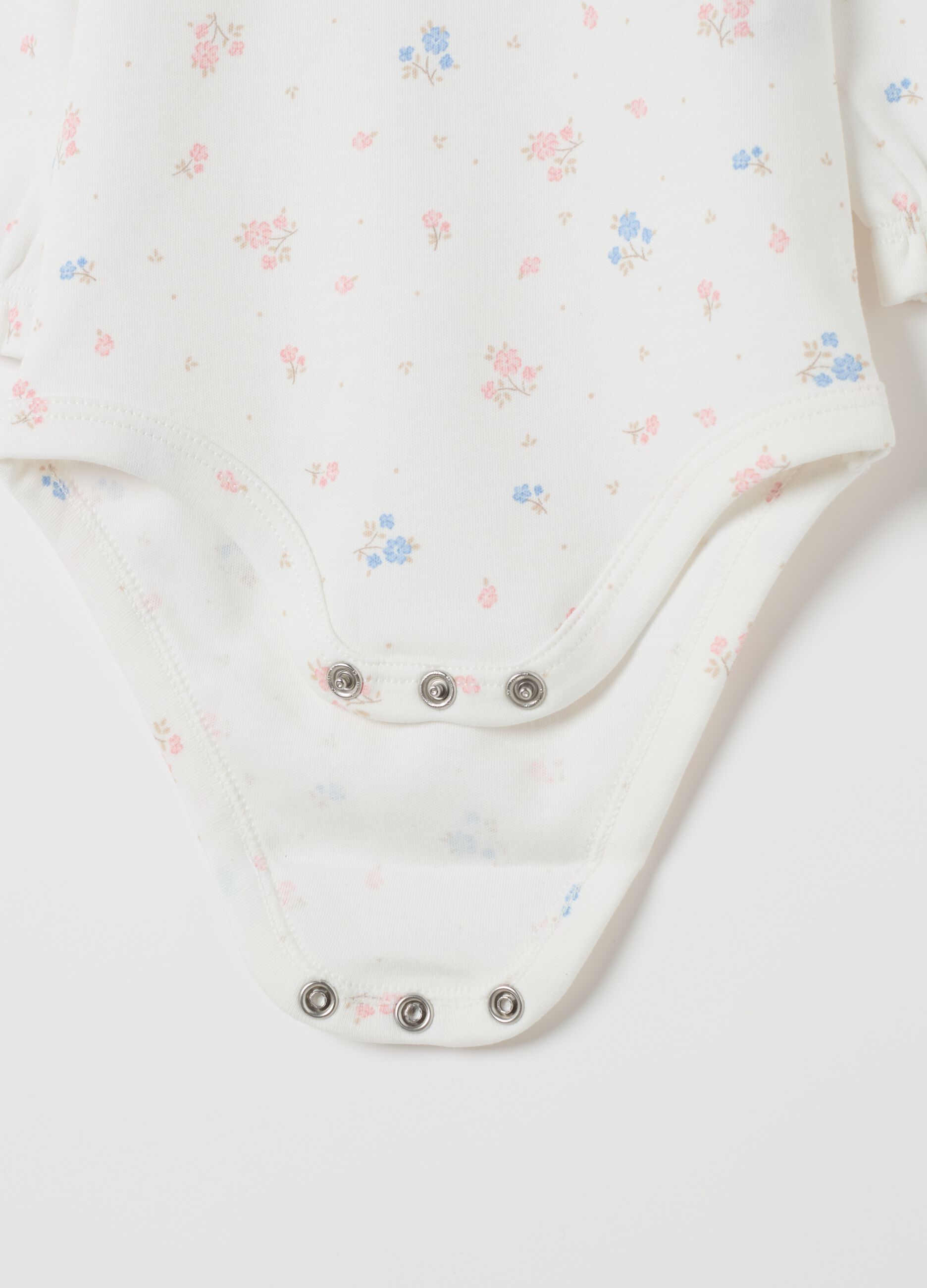 Floral bodysuit in organic cotton with collar