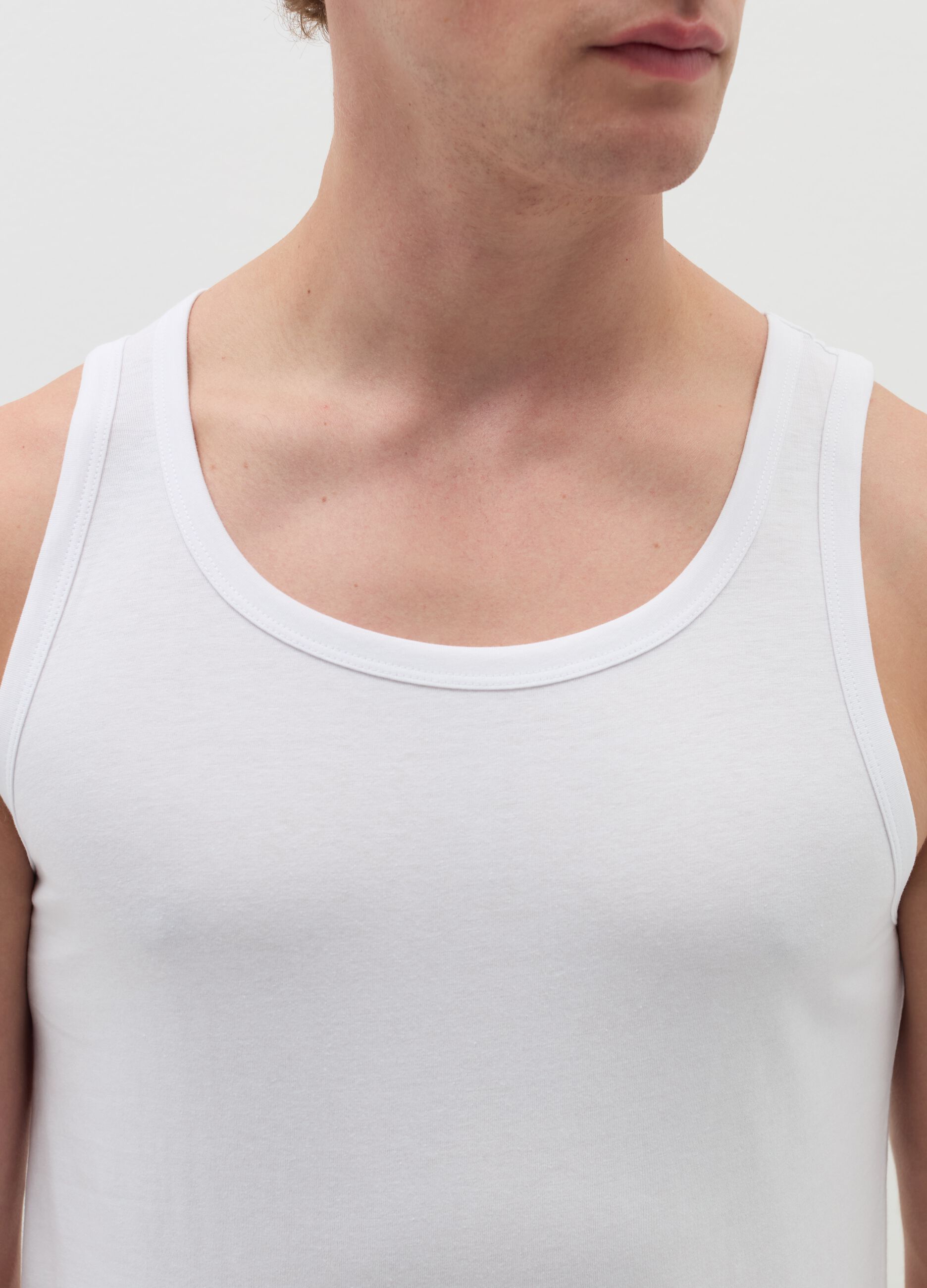 Three-pack racerback vests in organic cotton