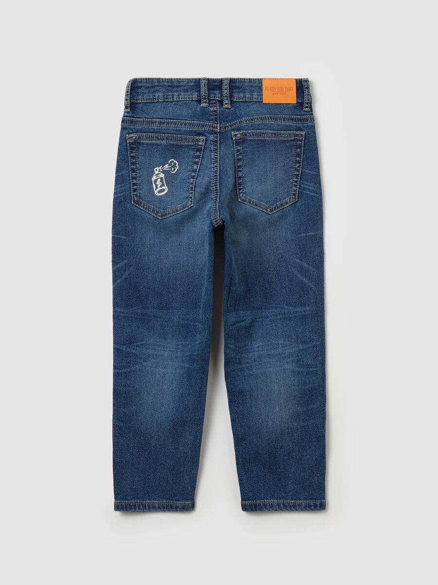 Jeans with five pockets and "Sk8 & Spray” print_1