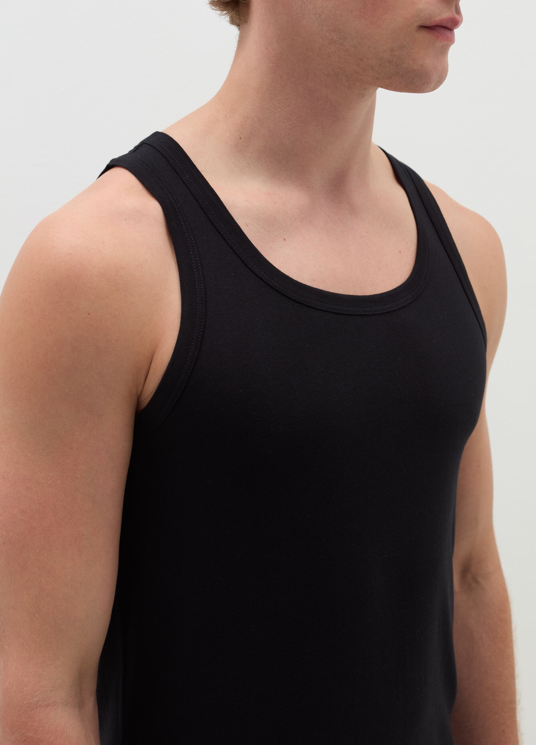 Three-pack racerback vests in organic cotton