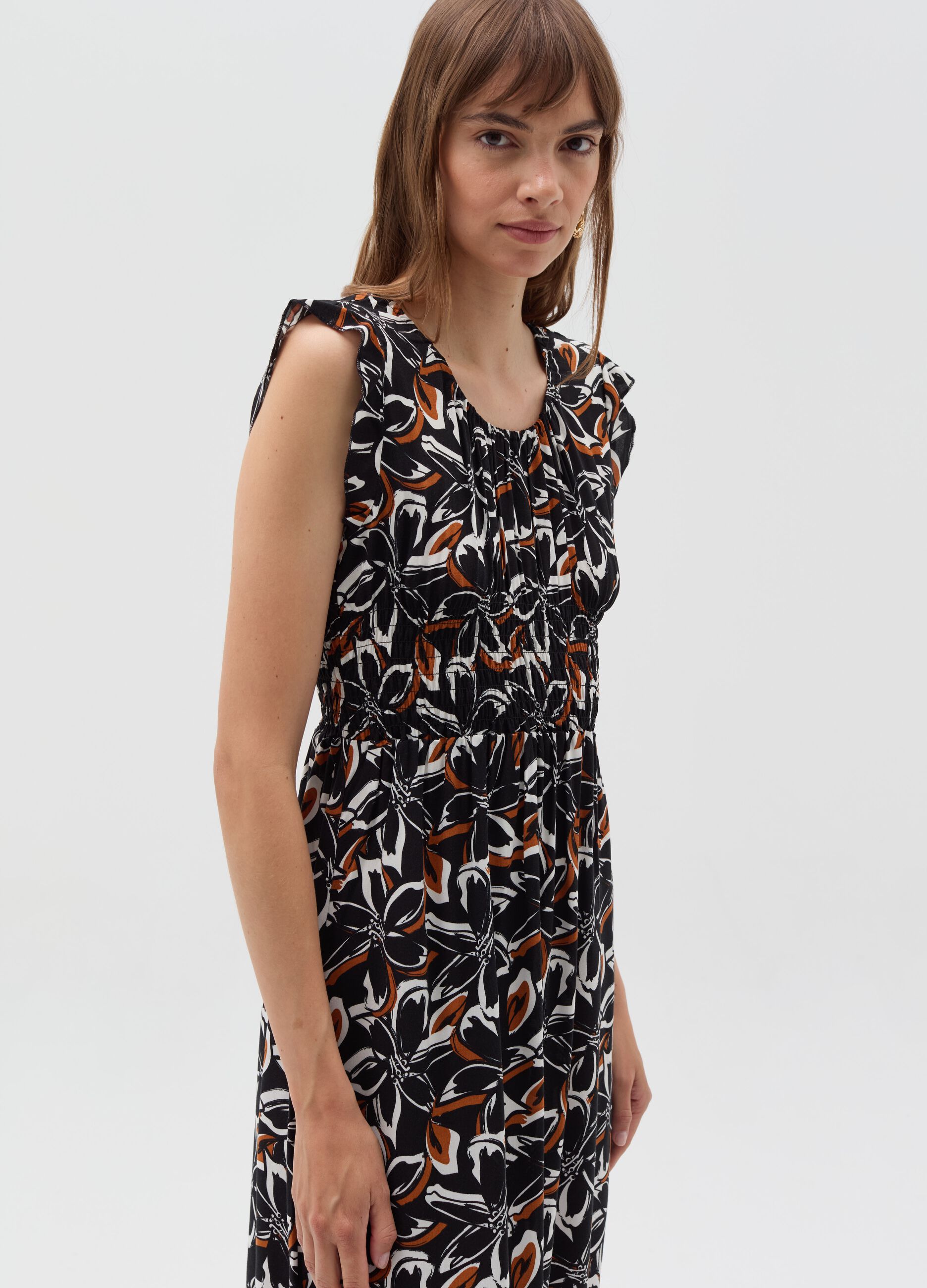 Long floral dress with smock stitch