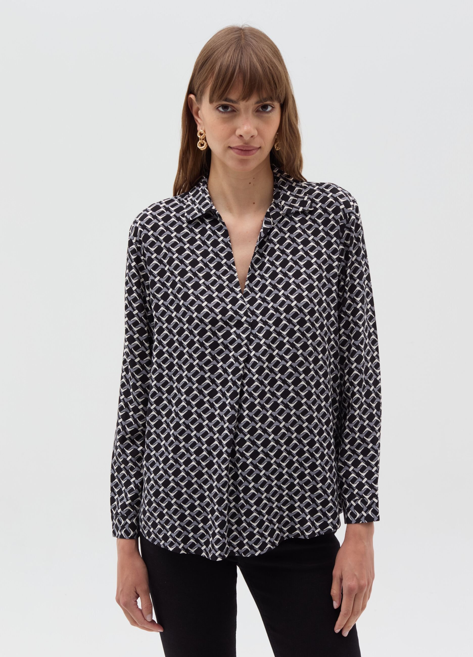 Blouse with polo neckline and long sleeves