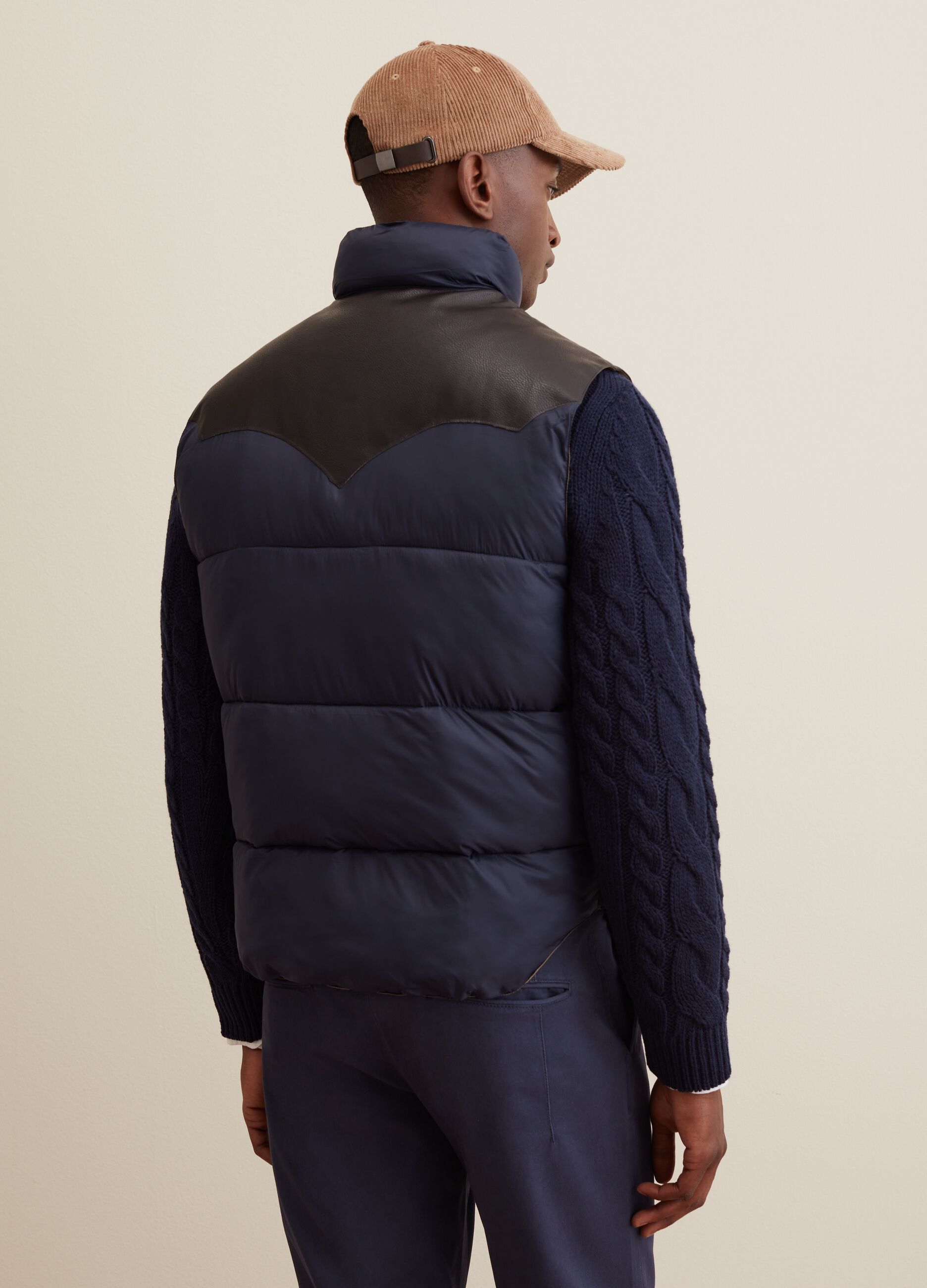 Quilted gilet with high collar