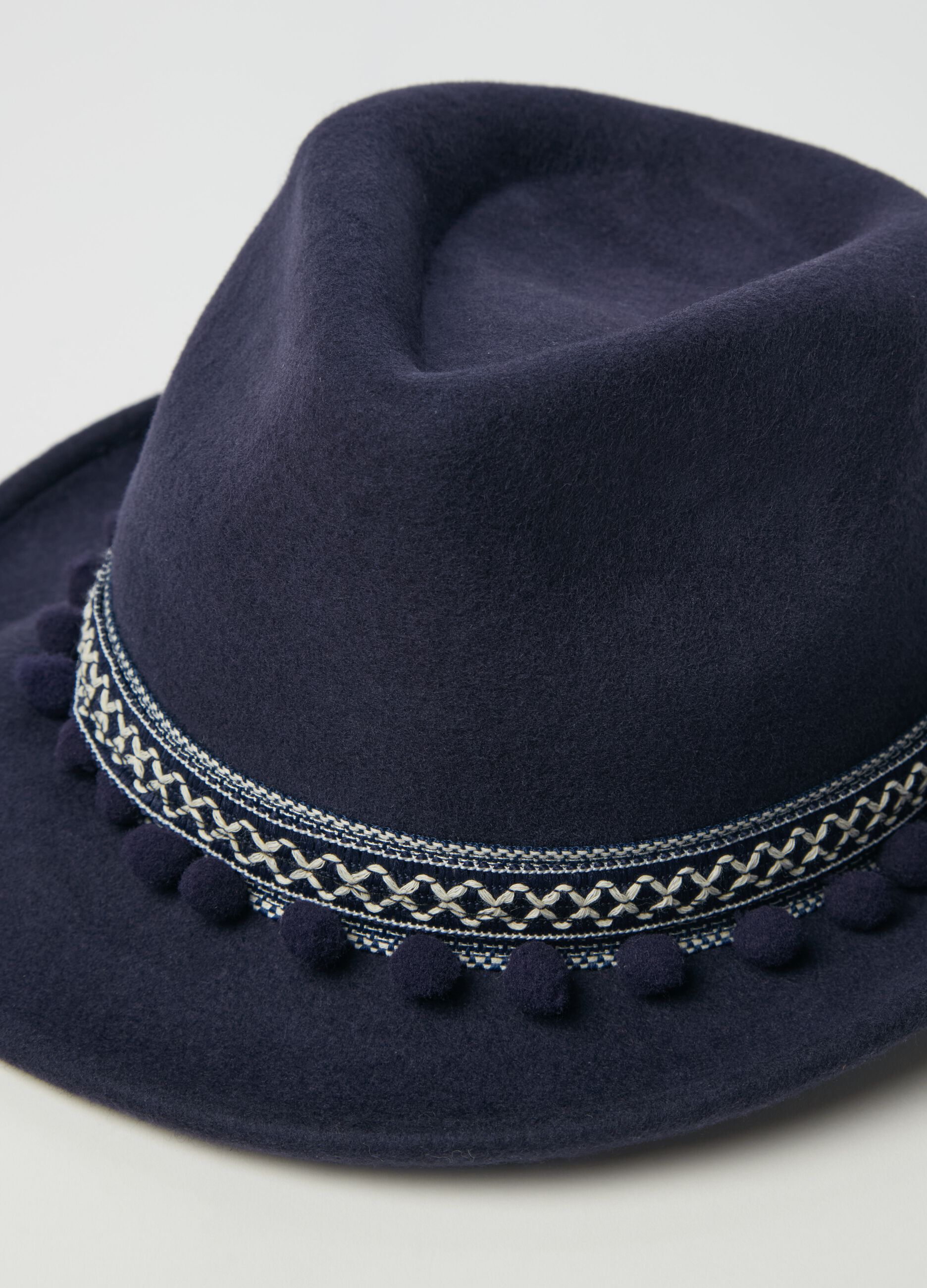 Felt hat with ethnic edging