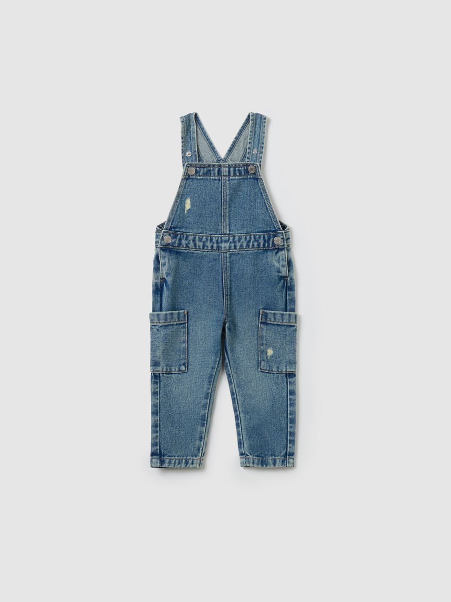 Denim dungarees with abrasions_0