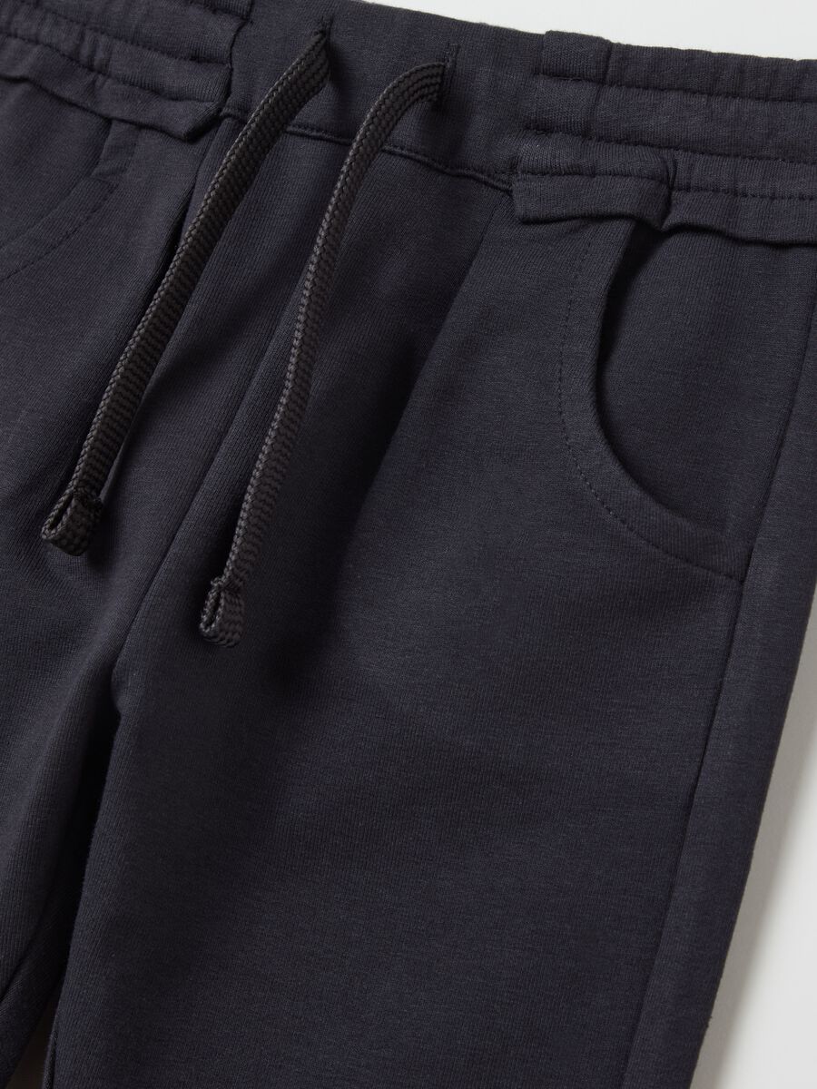 Fleece joggers with pockets and drawstring_2