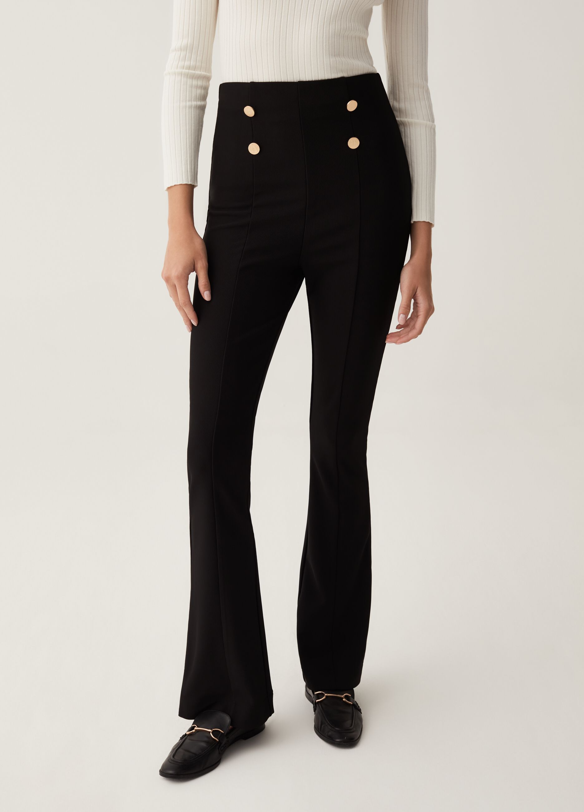 Flare-fit trousers with golden buttons