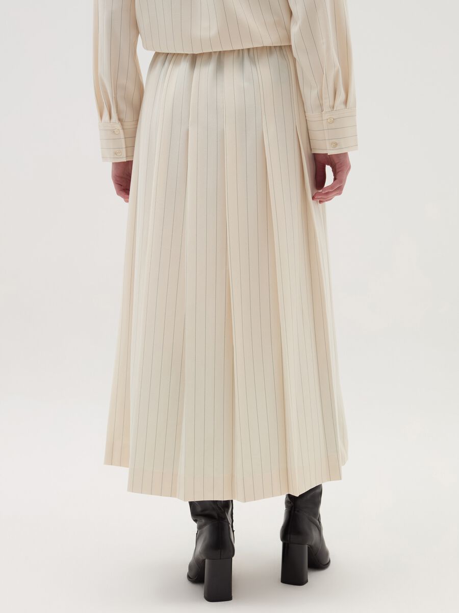 Long pinstriped skirt with split_3