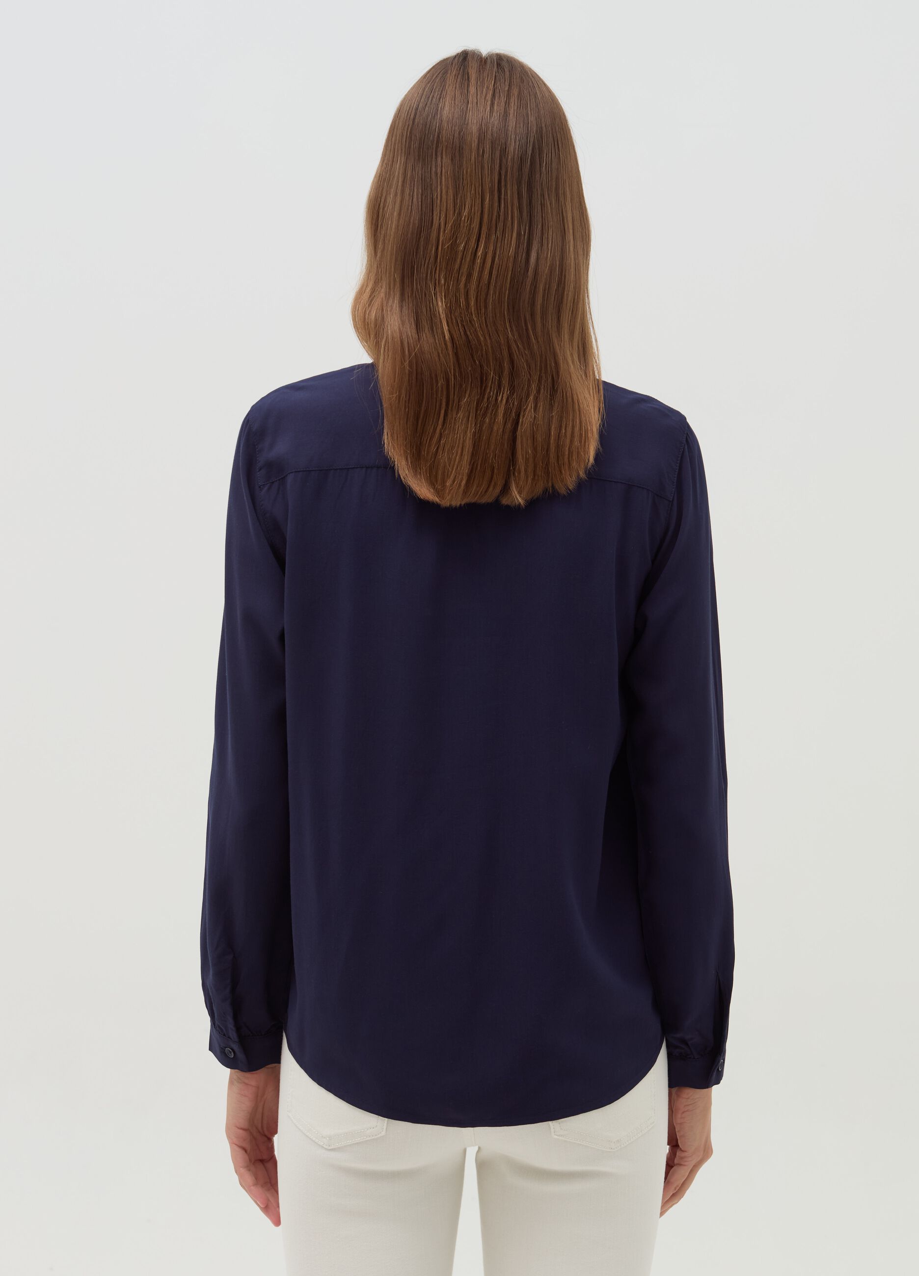 Shirt with pleated detail