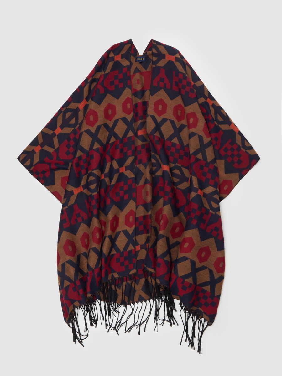 Poncho with jacquard designs and fringing_0