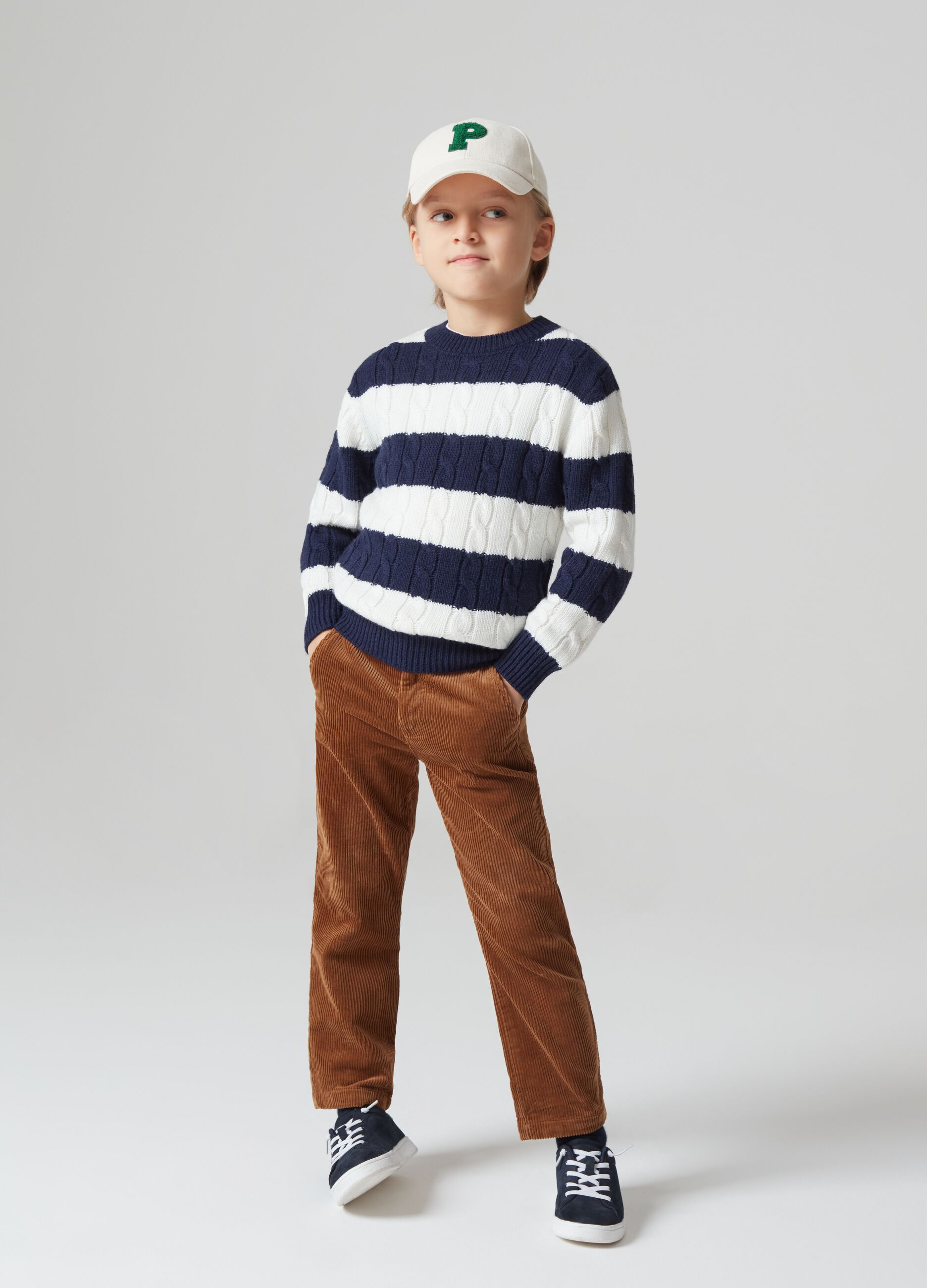 Striped pullover with cable-knit design