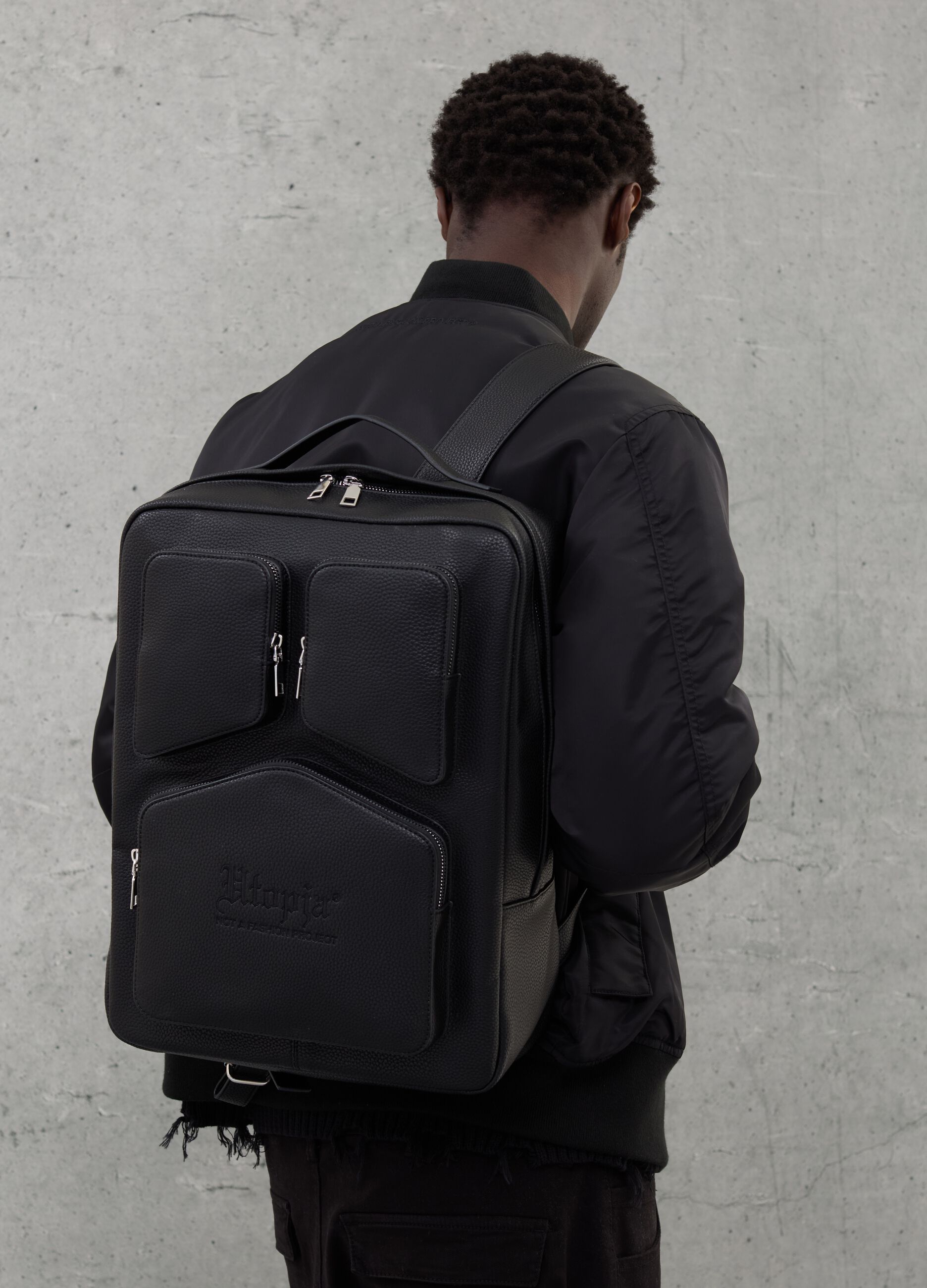 Textured black backpack with logo