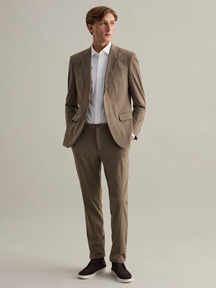 Contemporary chino trousers in technical fabric_0