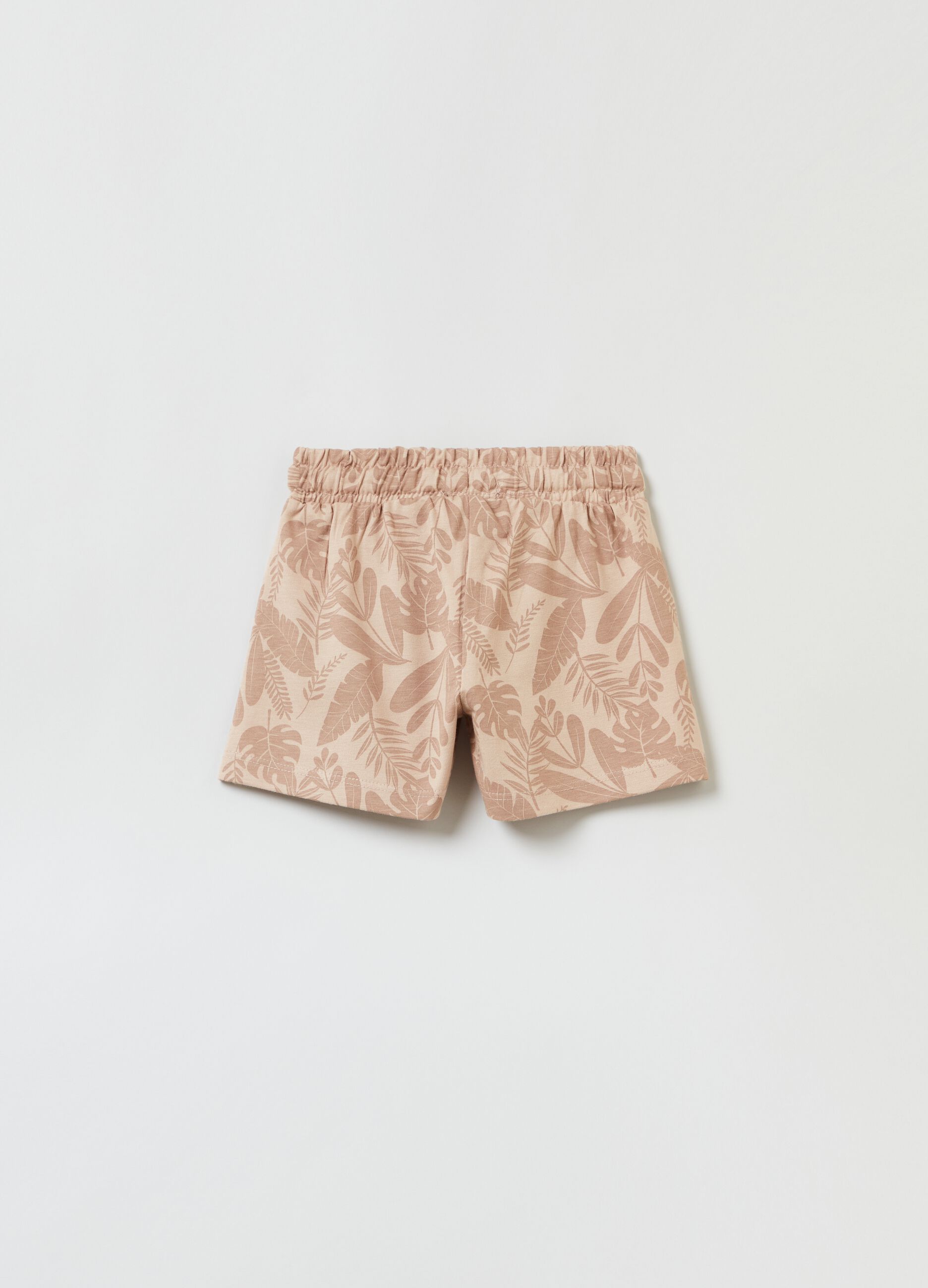 Shorts with all-over tropical leaves print