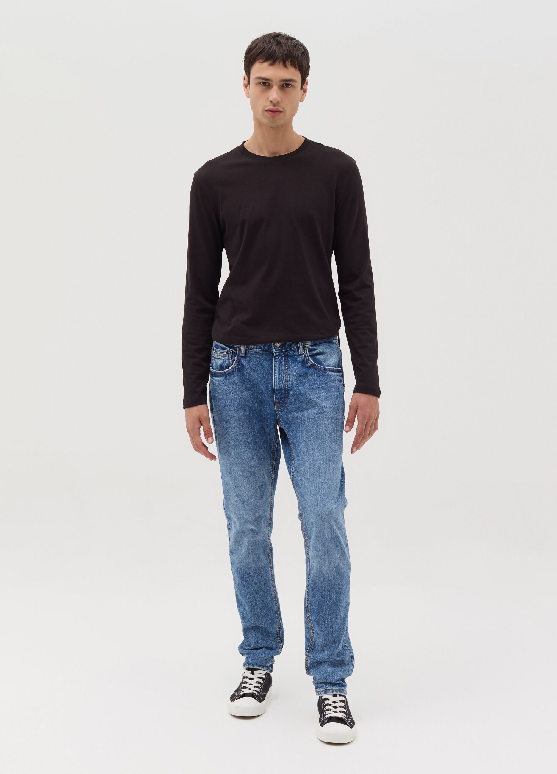 Slim-fit acid-wash jeans with fading