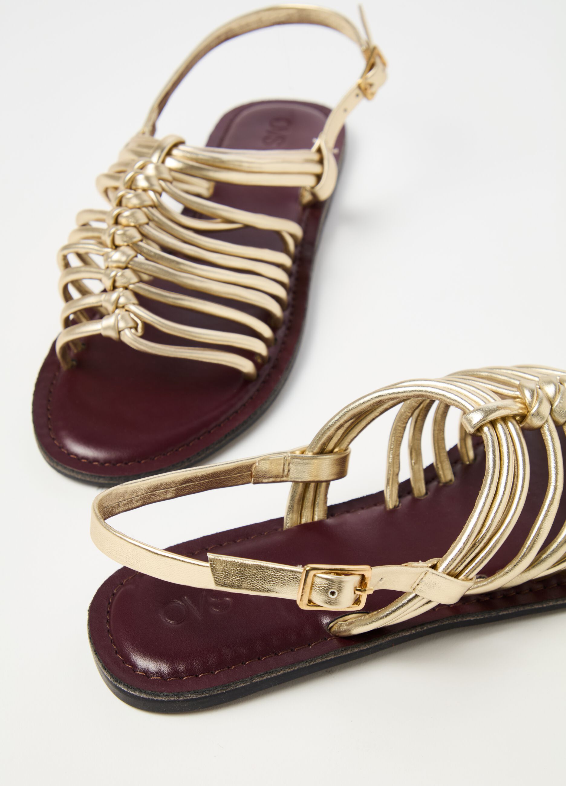 Gladiator sandals in metallic leather