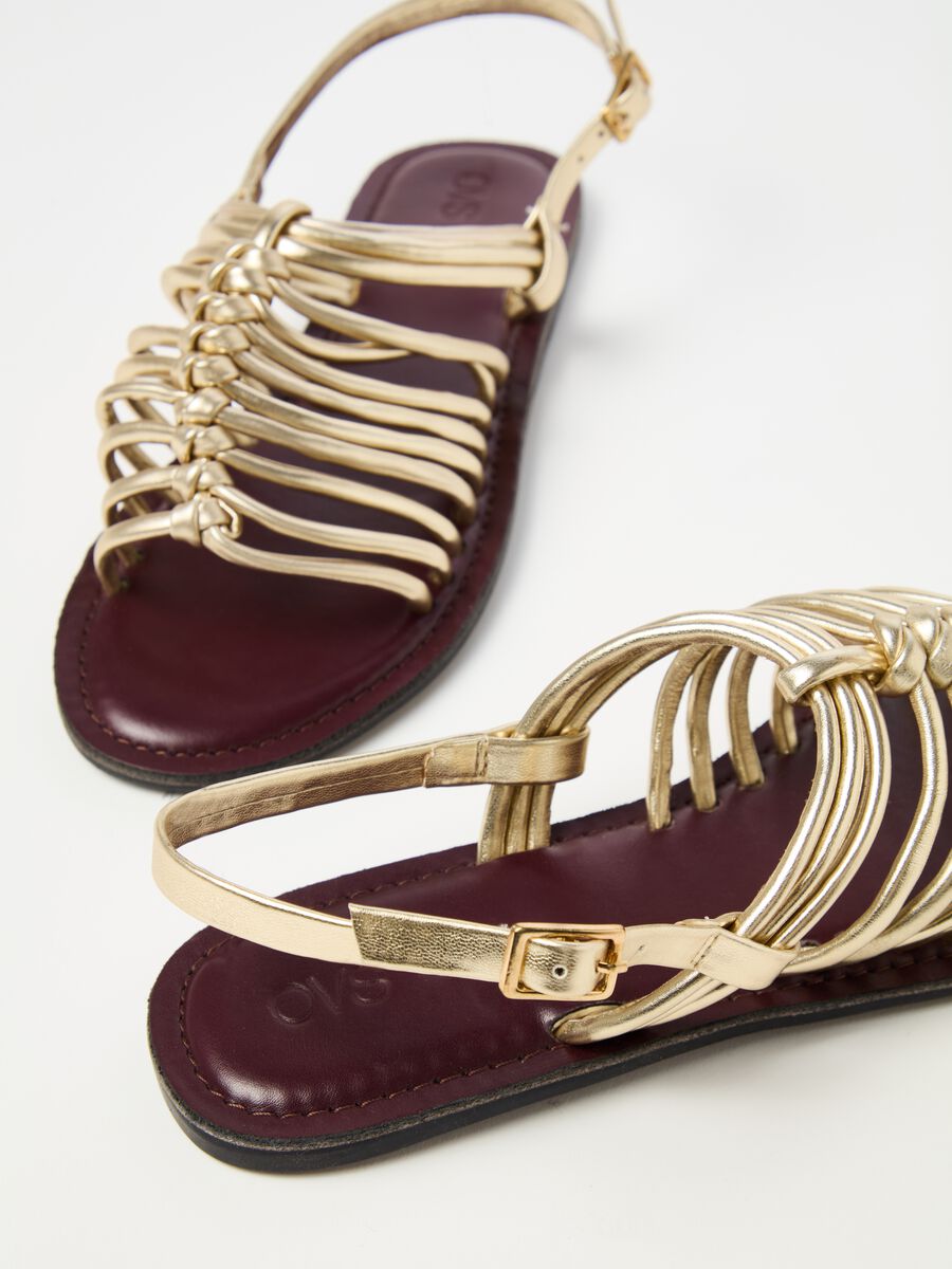 Gladiator sandals in metallic leather_1