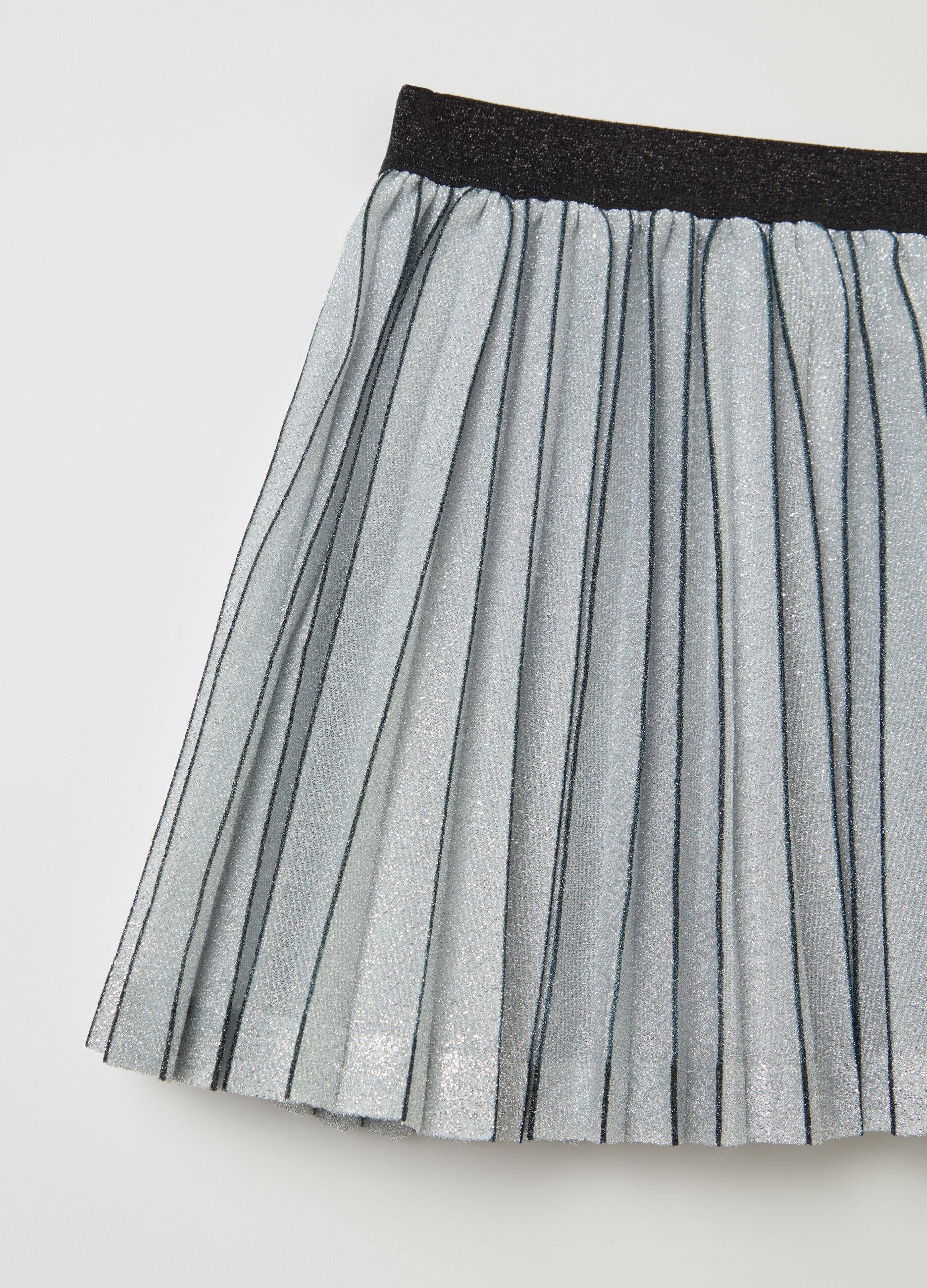 Short pleated skirt in lurex