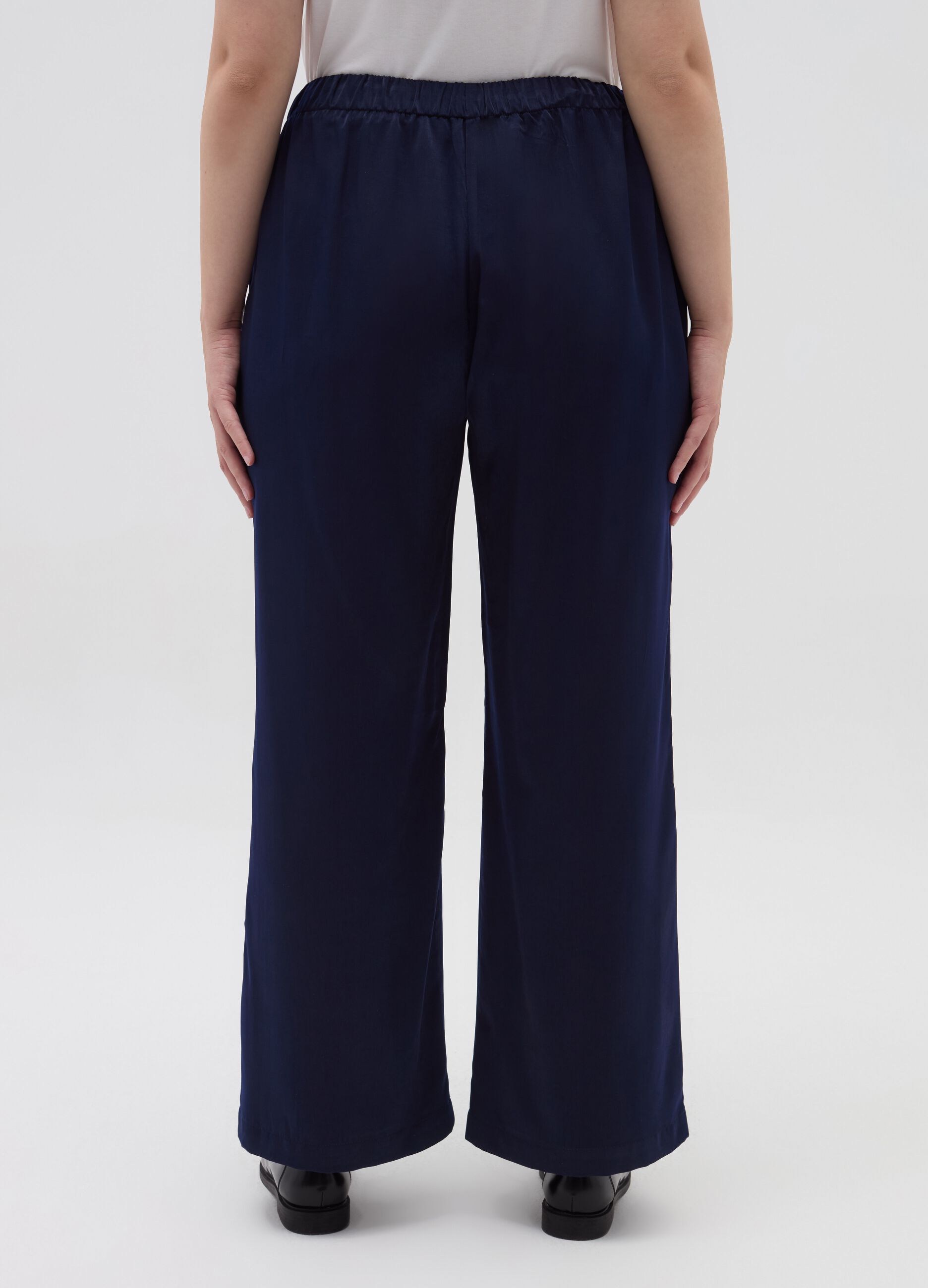 Curvy relaxed-fit fluid trousers