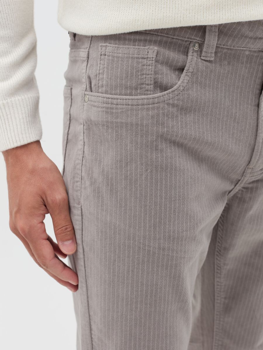 Pinstriped trousers with five pockets_3