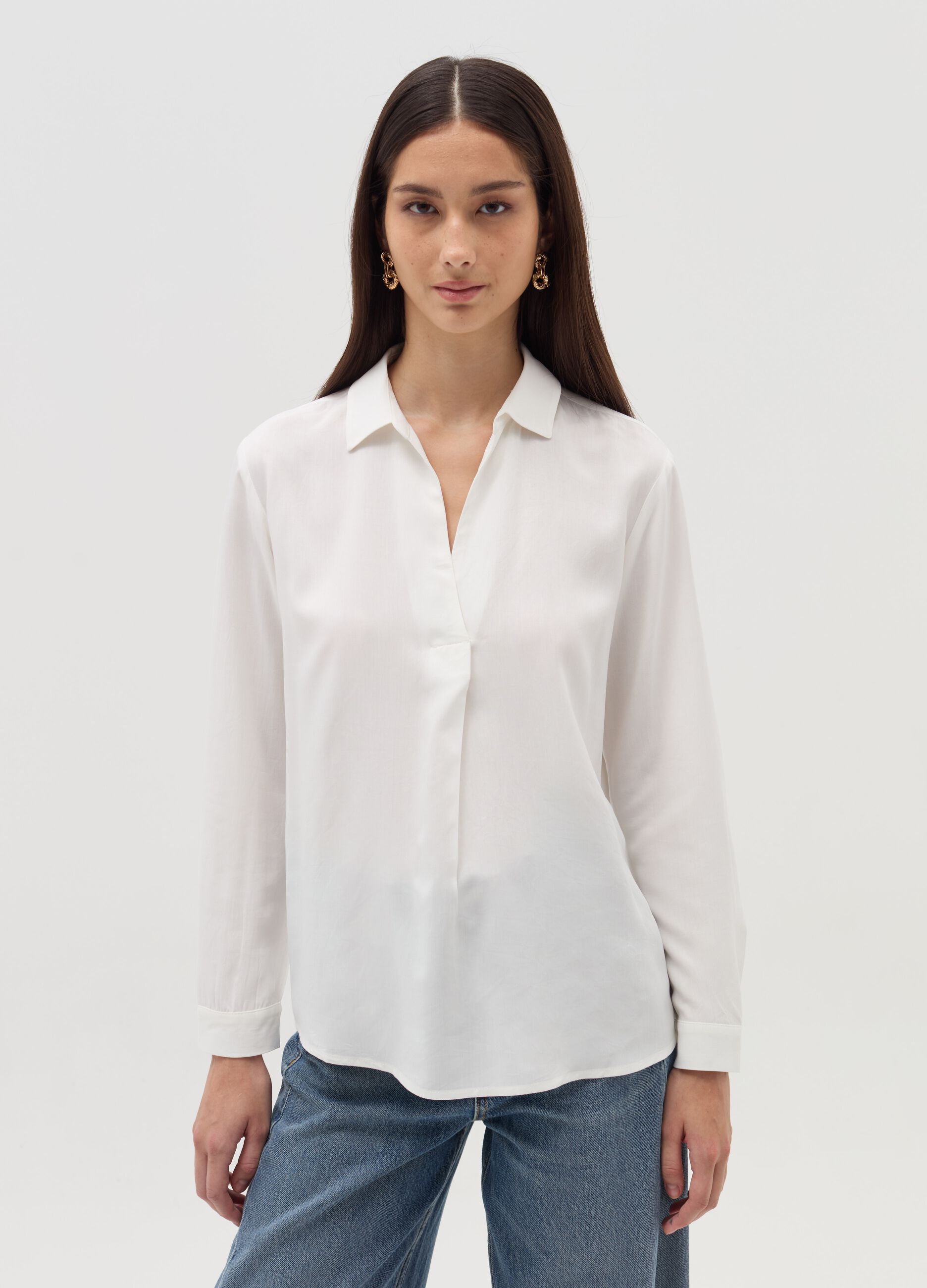 Blouse with polo neckline and long sleeves