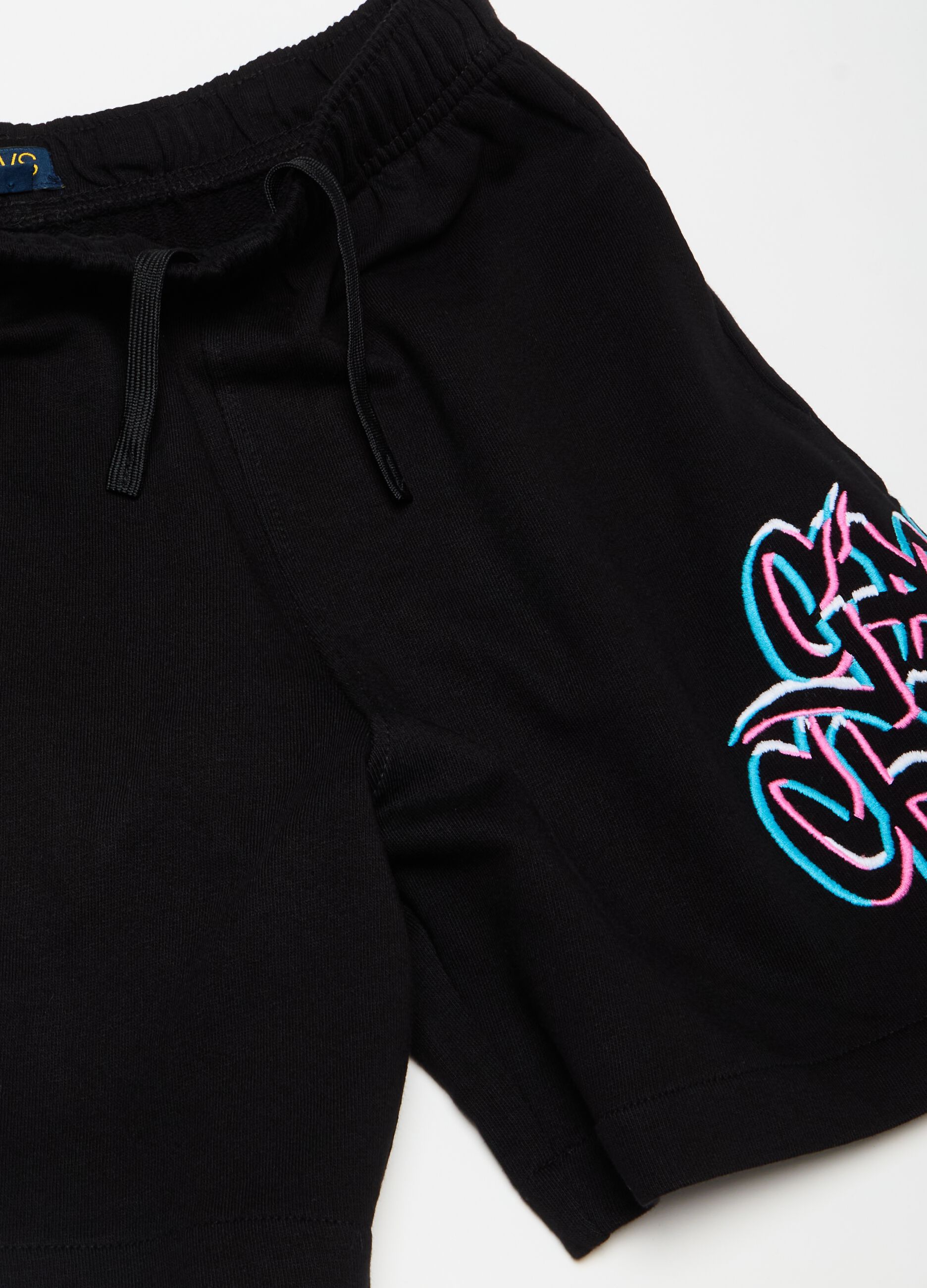 Bermuda joggers with embroidery