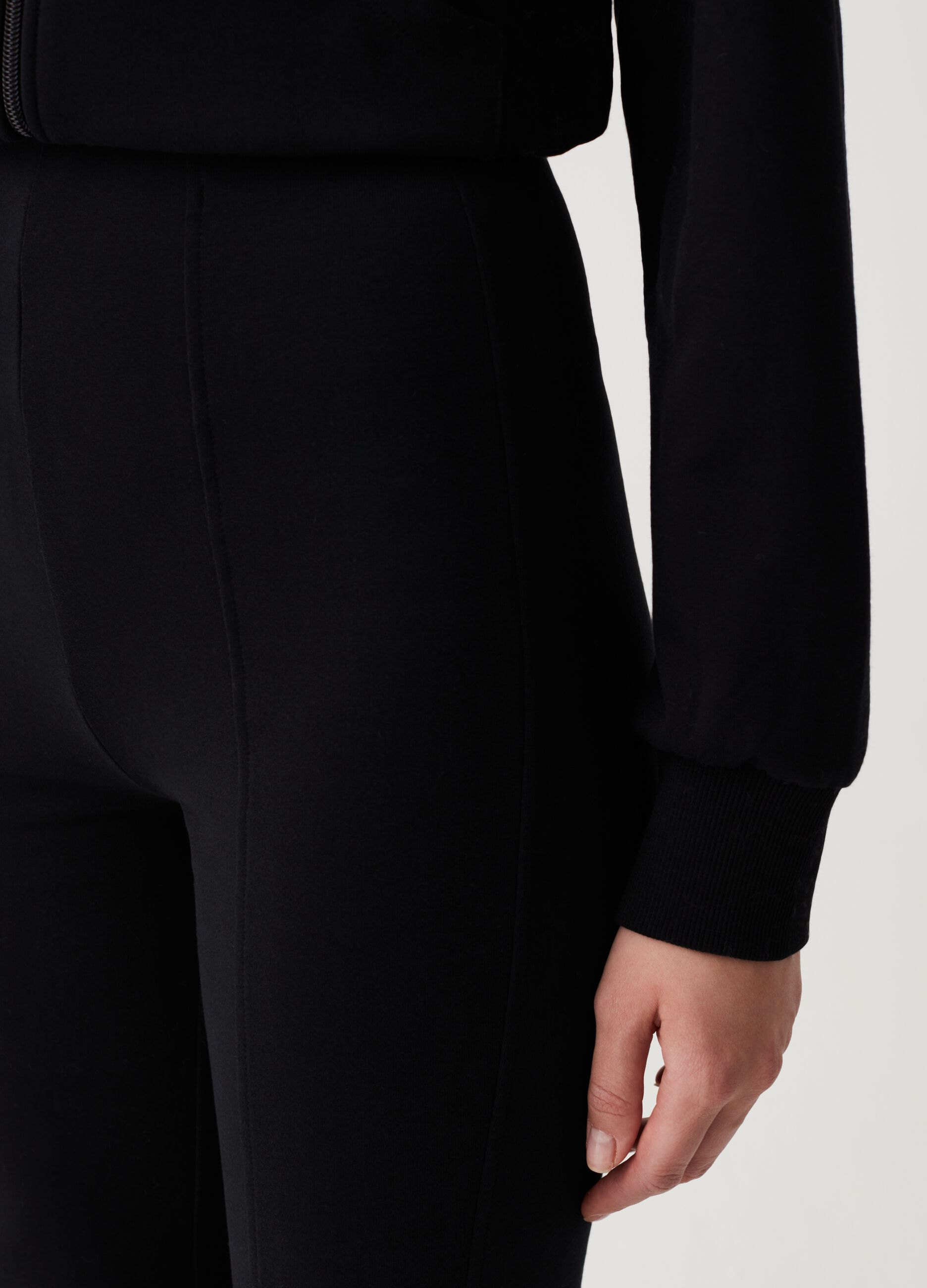 Flare-fit trousers with raised stitching