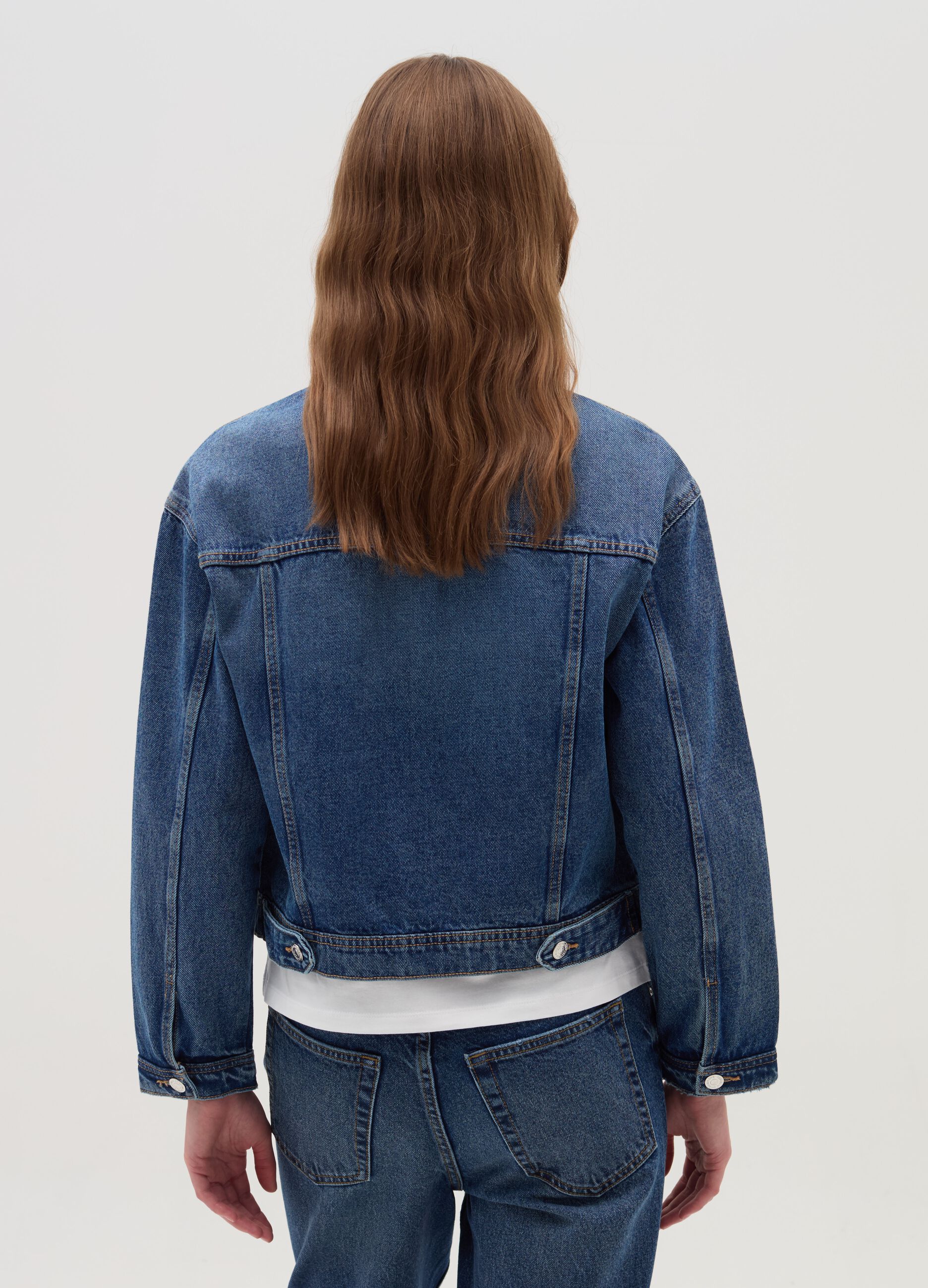 Denim jacket with abrasions