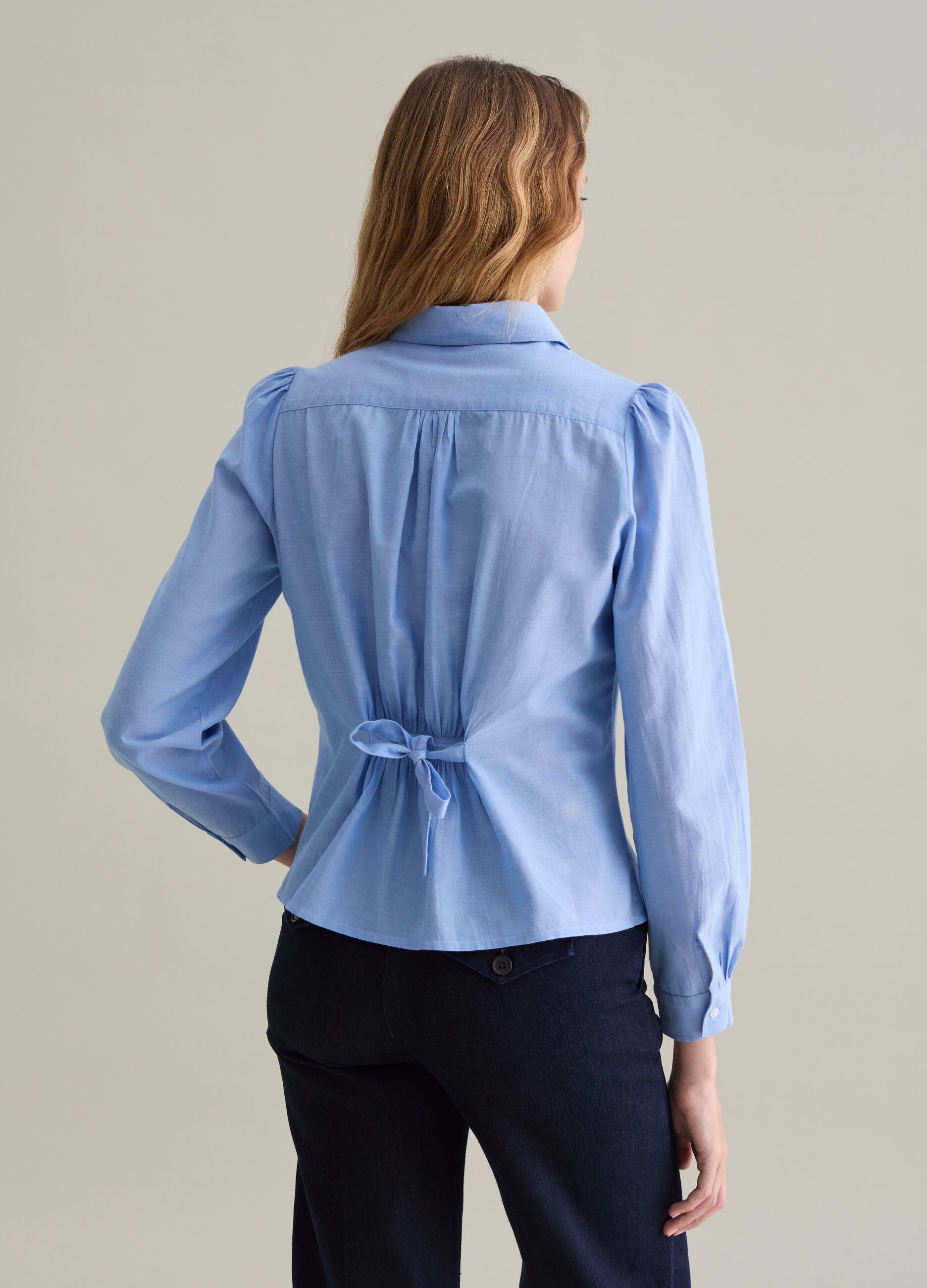 Shirt with pleated detail