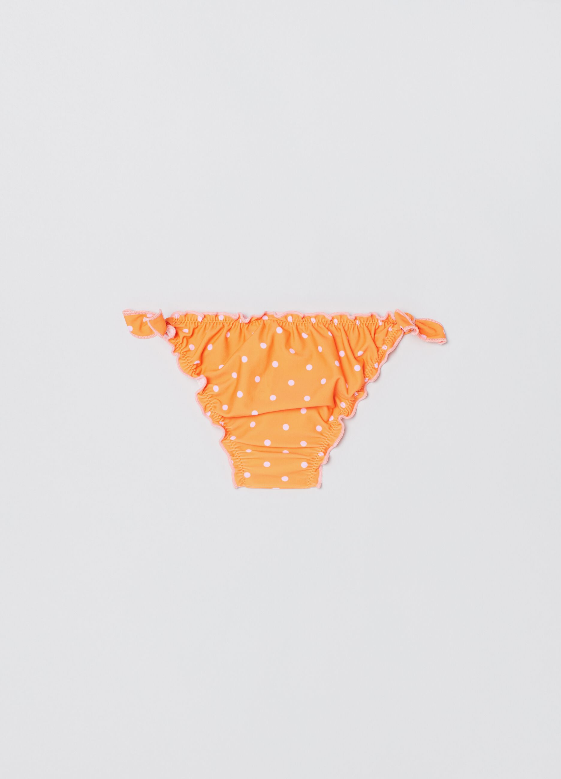 Swim briefs with polka dot print