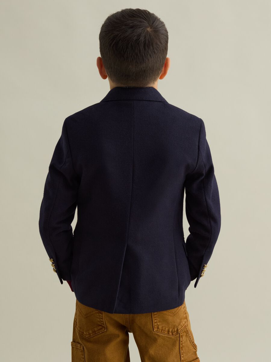 Single-breasted blazer with buttons in golden metal_1