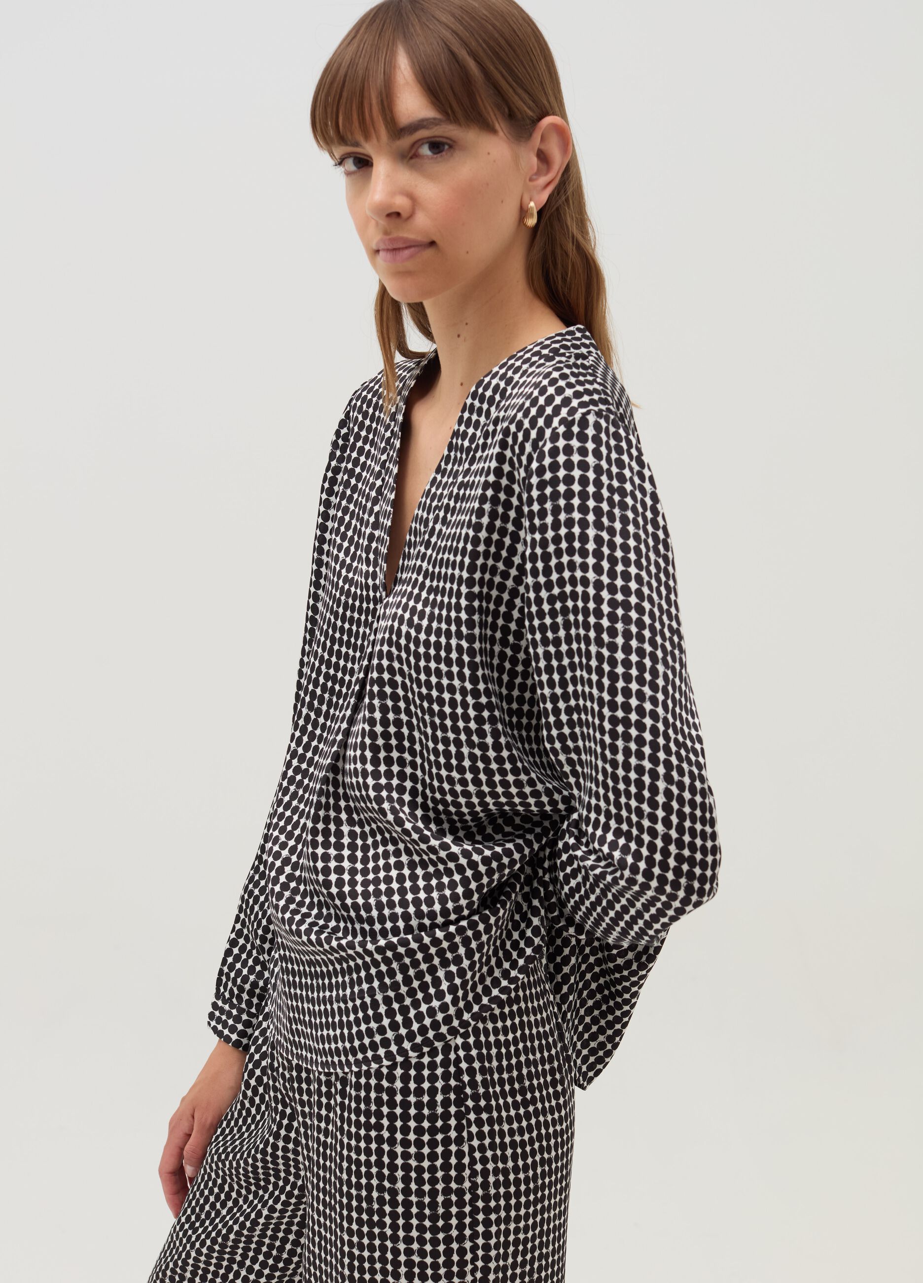 Blouse with polka dot pattern